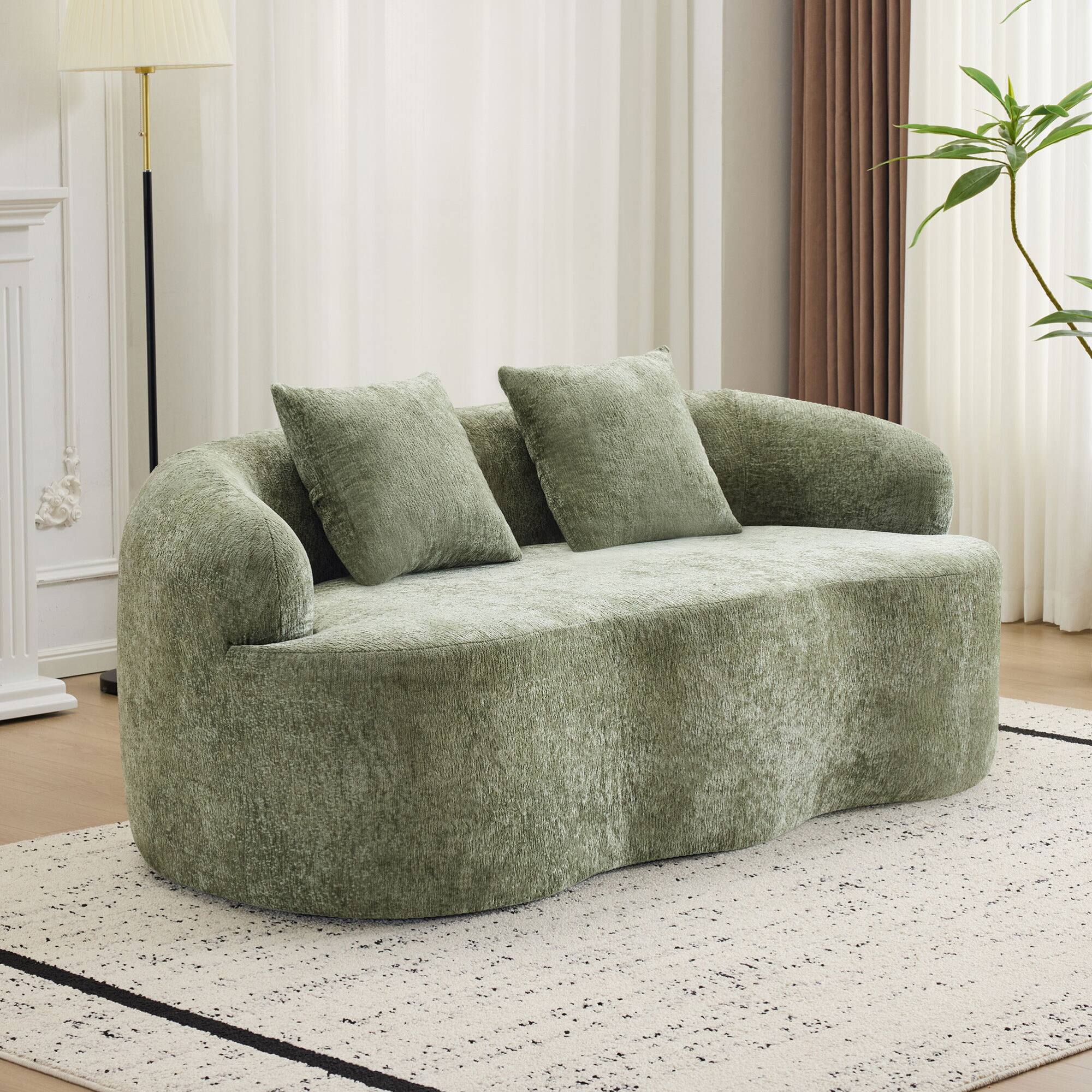 Angle. GOODSILO - Curved Loveseat Sofa with Round Armrest and Compression Cushioning, Includes Two Decorative Pillows - Green.