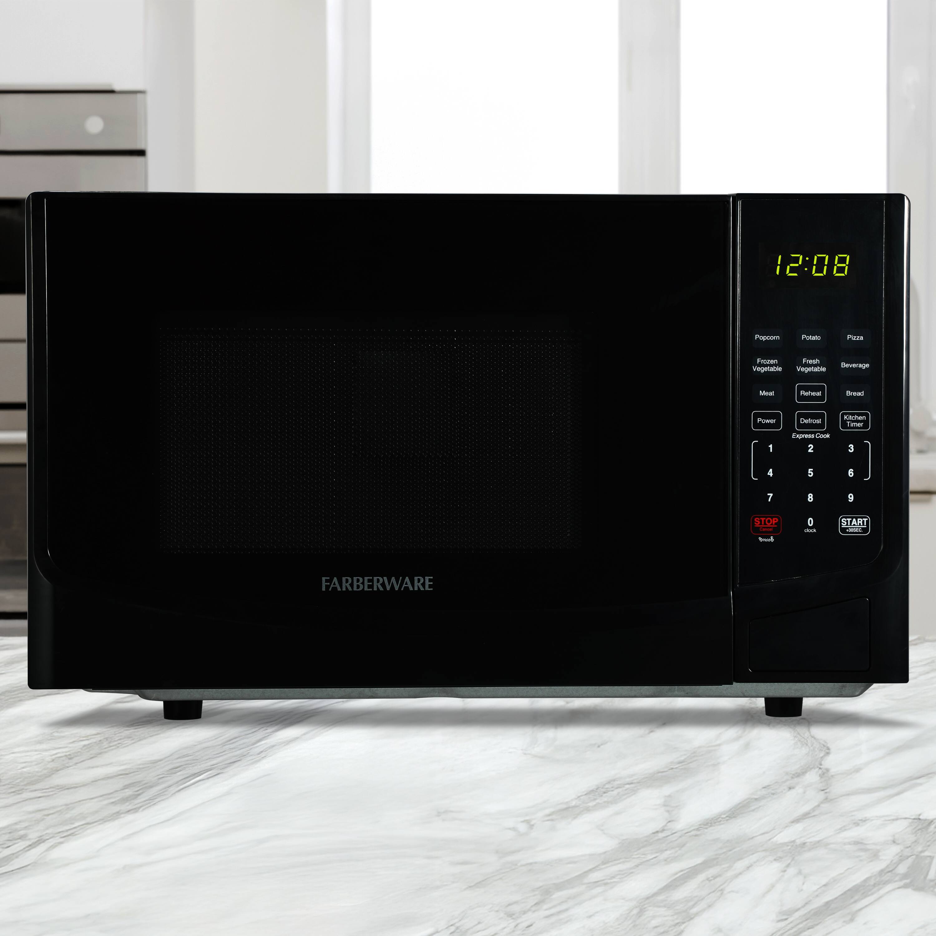 12:08  
Popcorn  
Frozen Vegetable  
Fresh Vegetable  
Beverage  
Meat  
Reheat  
Power  
Default  
Kitchen Timer  
Express Cook  
1  
2  
3  
4  
5  
6  
7  
8  
9  
0  
STOP  
START  
FARBERWARE