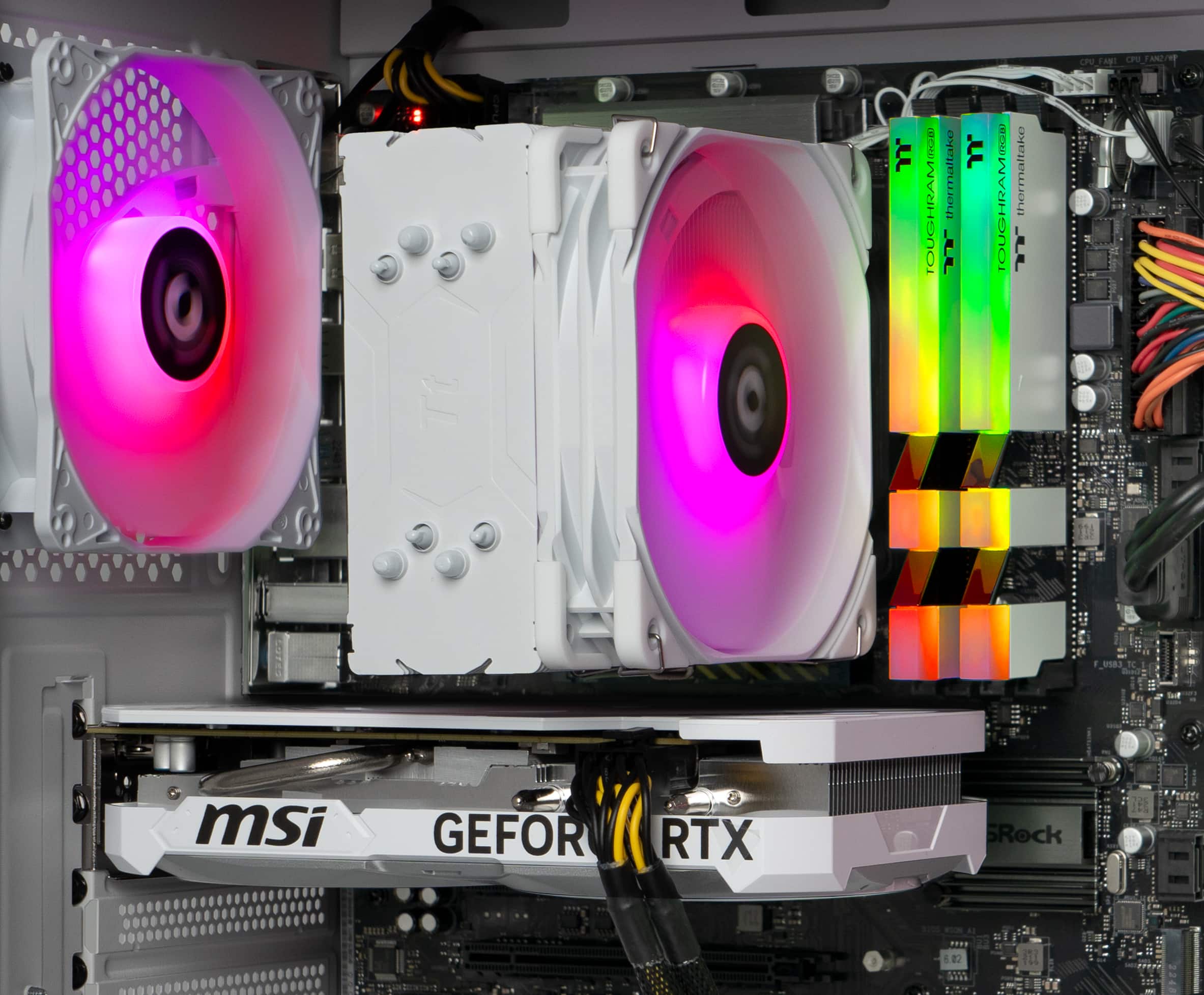 The text on the image reads:
"CPIFA CPU_F ANC/V CPU thermaltake JJ. ia thermaltake TOUGHRAMIRR LL TOUGHRAMIGR TOuG T 0 1 uS83 C t N% TNET 231 : E msi GEFOR RTX SRock 5 02 Il : A"
The corrected text would be:
"CPIFA CPU_F ANC/V CPU thermaltake JJ. ia thermaltake TOUGHRAMIRR LL TOUGHRAMIGR TOuG T 0 1 uS83 C t N% TNET 231 : E msi GEFORCE RTX 2080 Ti"