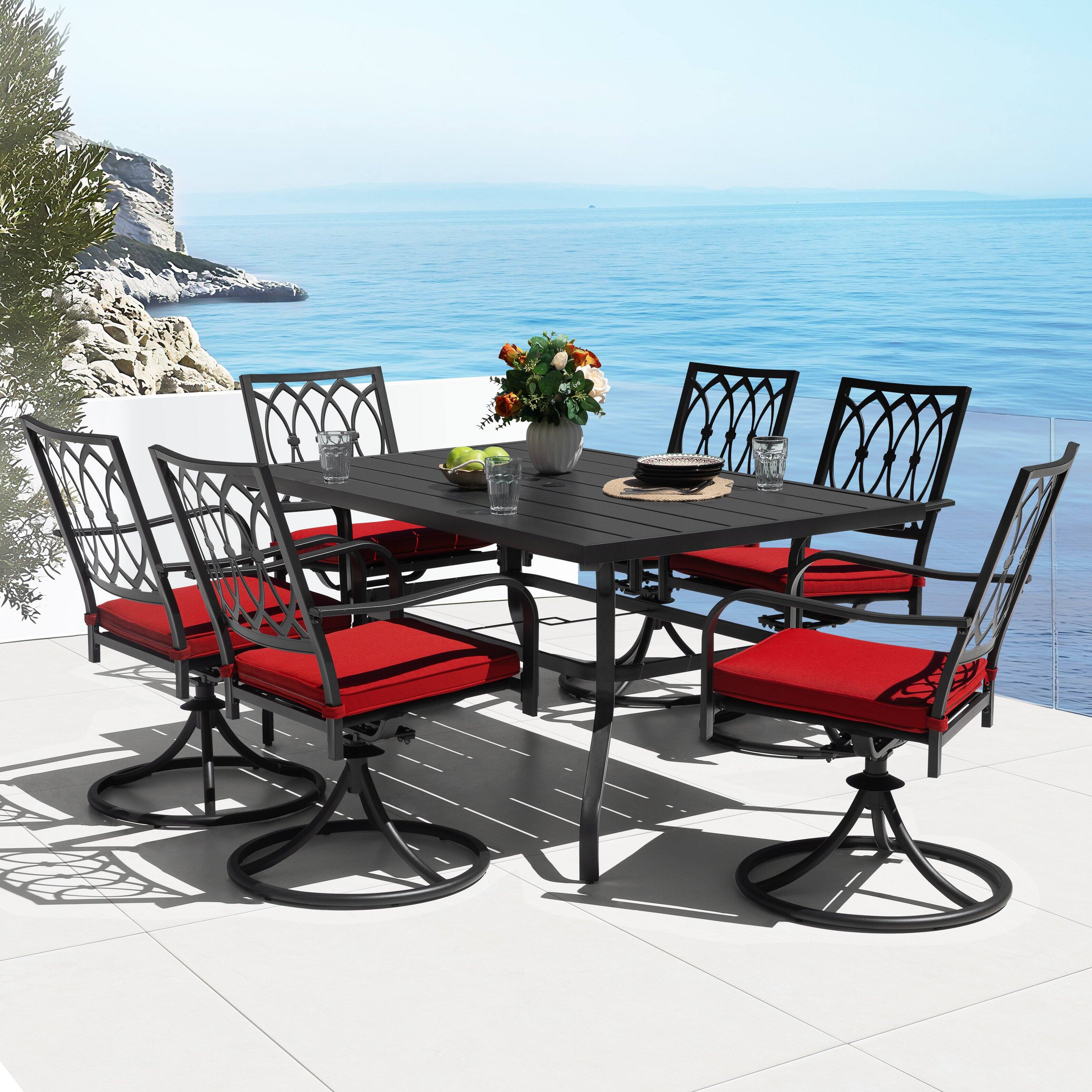 Angle. Nuu Garden - 7PCS Metal Patio Dining Set with Umbrella Hole, Swivel Chairs with Cushions - Black and Red.