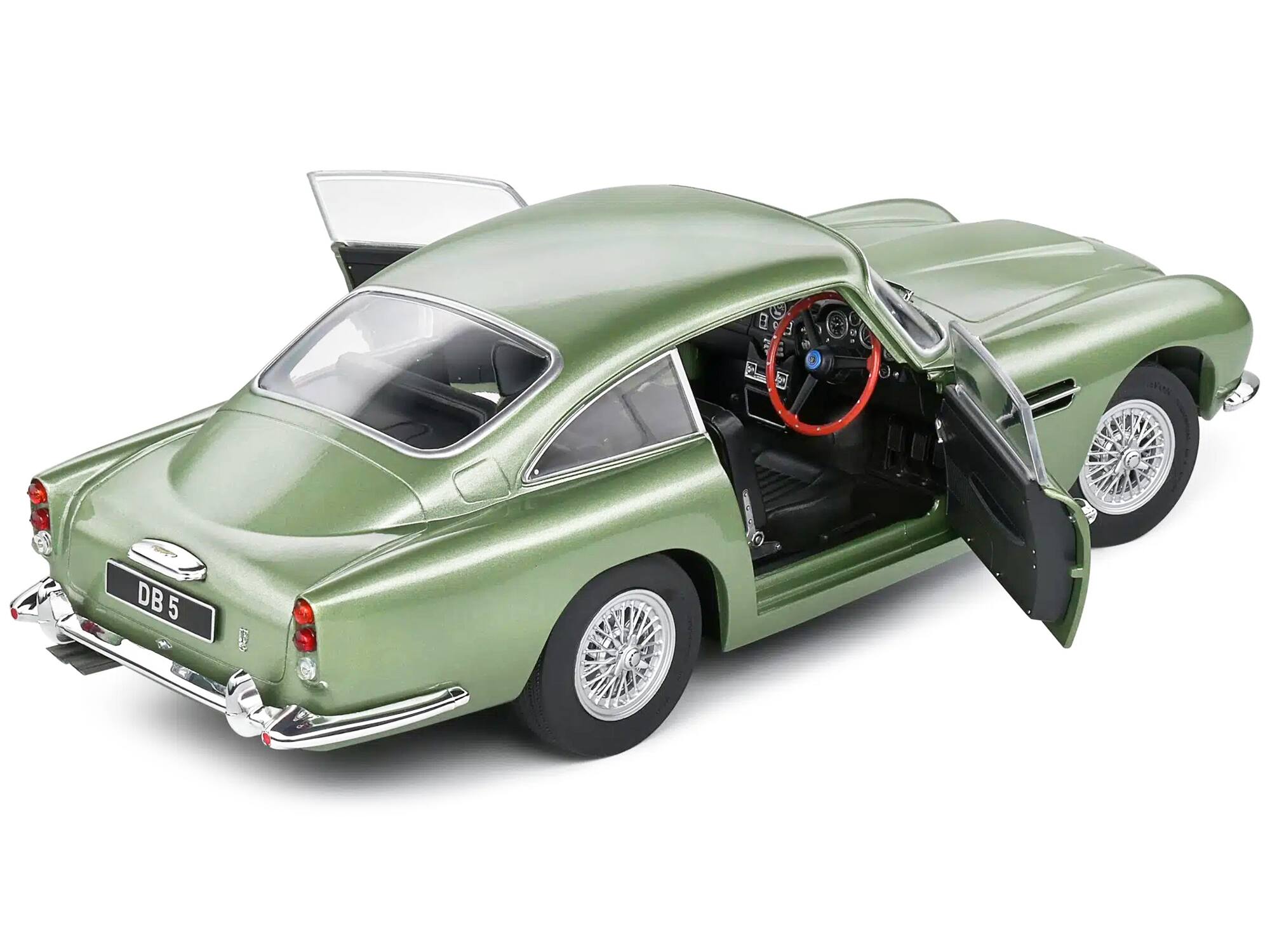 Back. Solido - 1964 Aston Martin DB5 RHD (Right Hand Drive) Porcelain Green Metallic 1/18 Diecast Model Car by Solido - Green Metallic.
