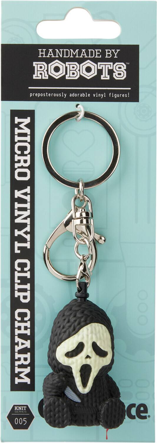 HANDMADE BY ROBOTS  
preposterously adorable vinyl figures!  

MICRO VINYL CLIP CHARM  

KNIT SERIES 005