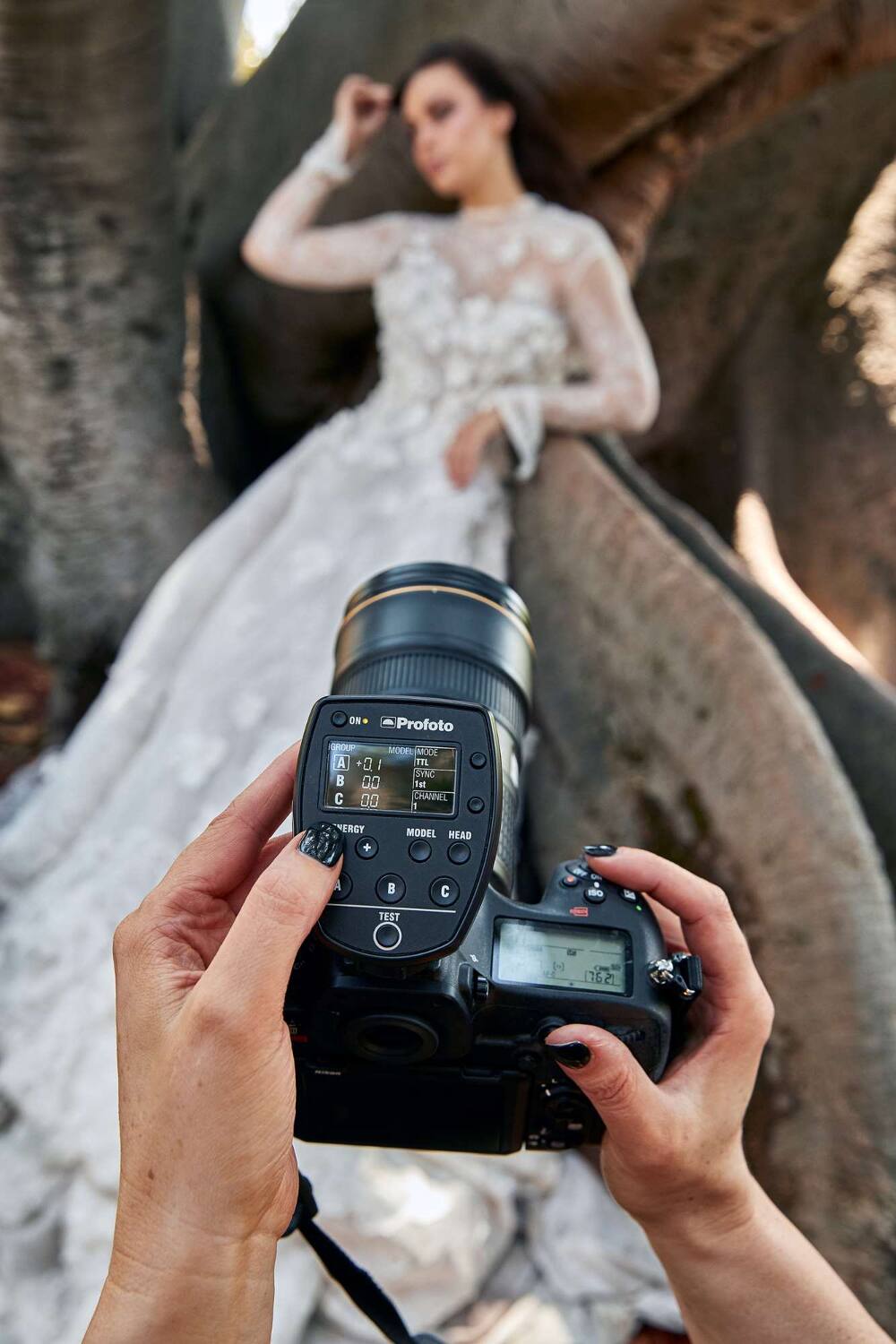 ON  
Profoto  
GROUP MODE  
A + C  
I mIL SONC  
00 1et C 00  
CHANNEL 1  
ENERGY + MODEL HEAD  
A C  
TEST  
[~]  
7621