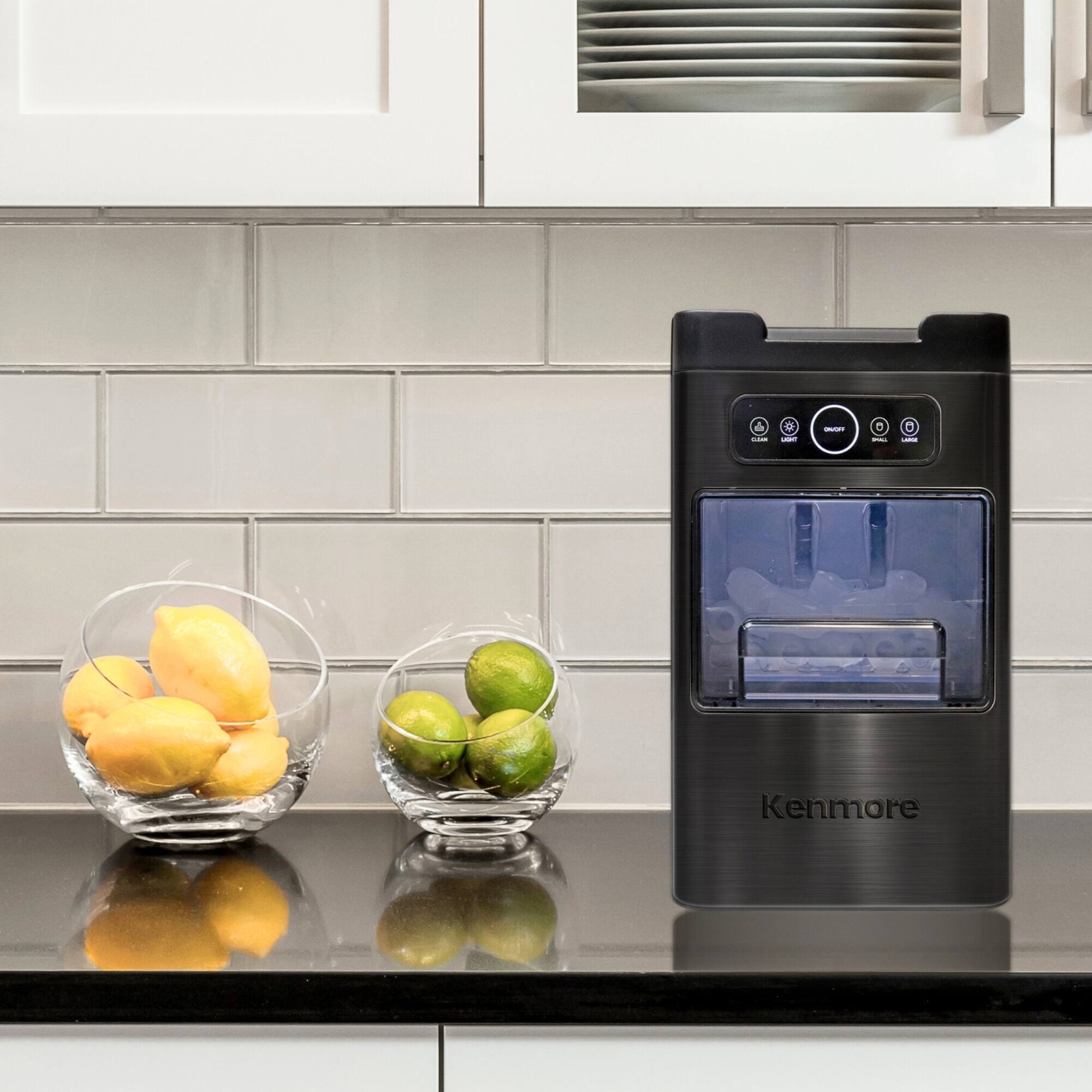 Left. Kenmore - Front-Load Countertop Ice Maker | 26lb/24hrs | 2 Ice Sizes | Self-Cleaning | Stainless Steel - Black stainless steel.