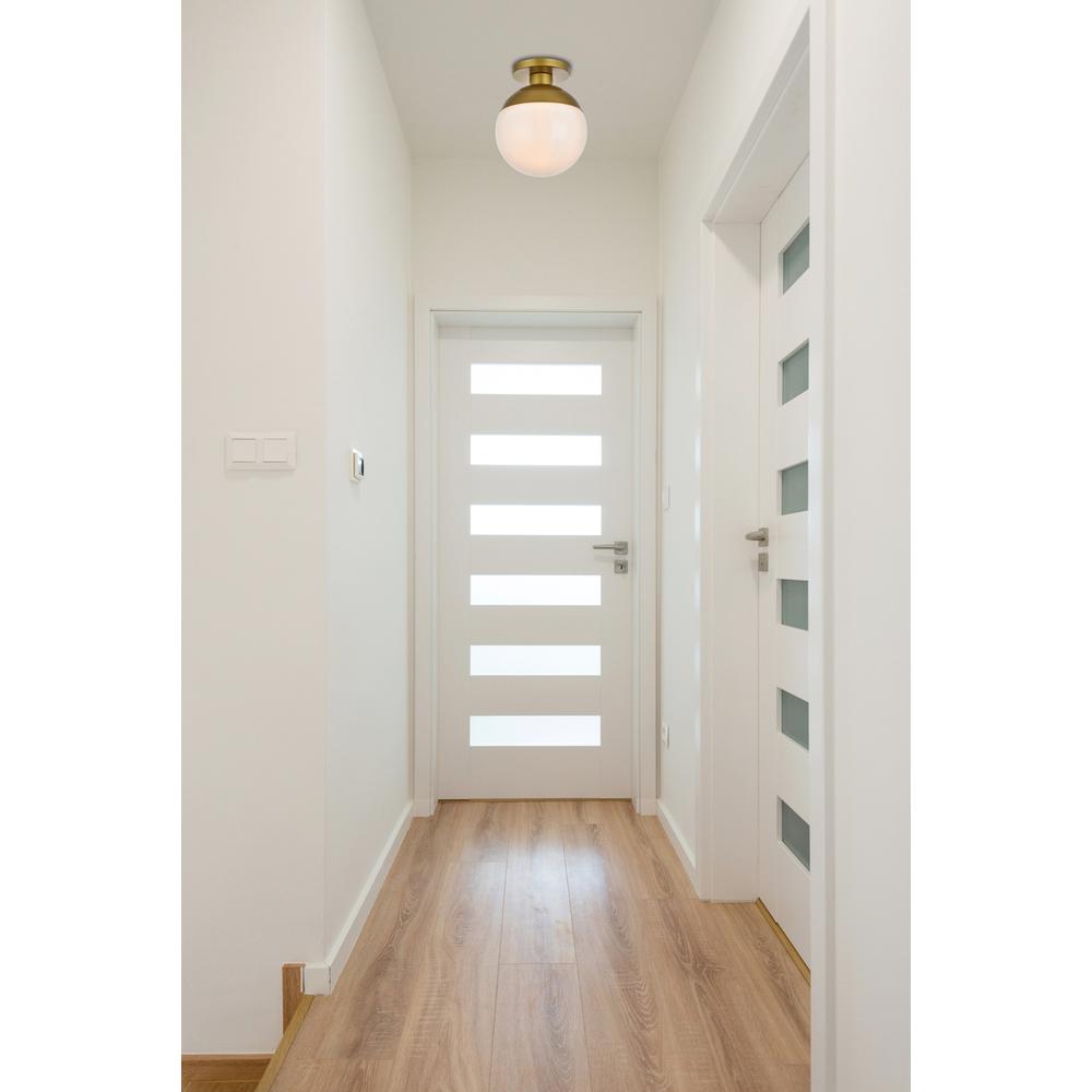 Angle. Living District - Eclipse 1 Light Brass Flush Mount With Frosted White Glass - Brass And Frosted White.