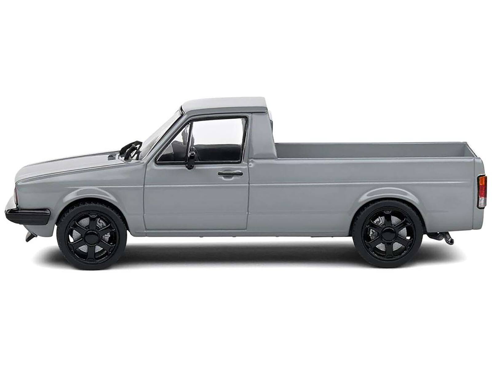 Angle. Solido - 1982 Volkswagen Caddy MKI Pickup Truck Nardo Gray 1/43 Diecast Model Car by Solido - Gray.