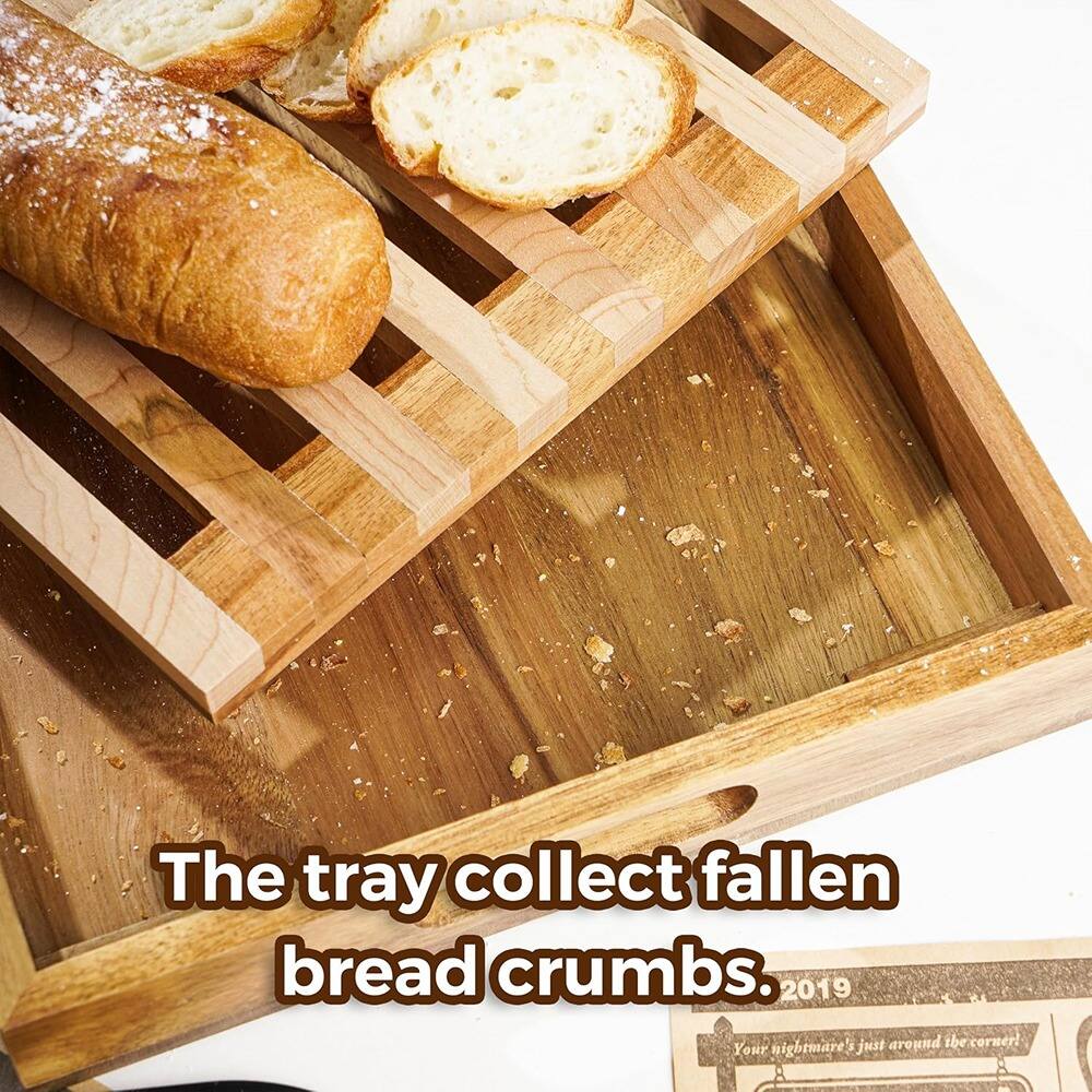 The tray collects fallen bread crumbs.  
2019: Your nightmare is just around the corner!