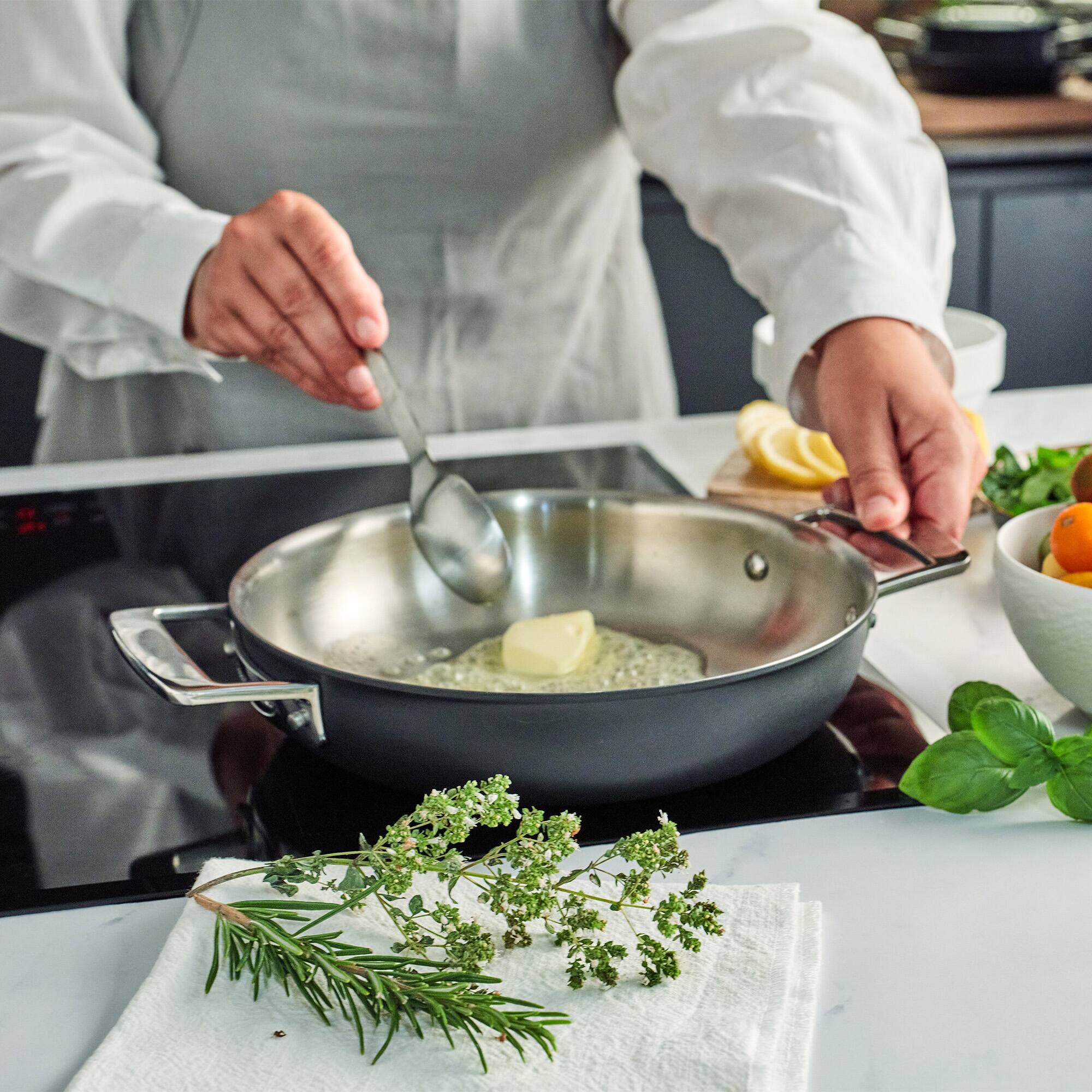 Alt View 1. Demeyere - Demeyere Black 5 Stainless Steel with Ceramic exterior coating 9.5-in Double Handle Fry Pan - Black.