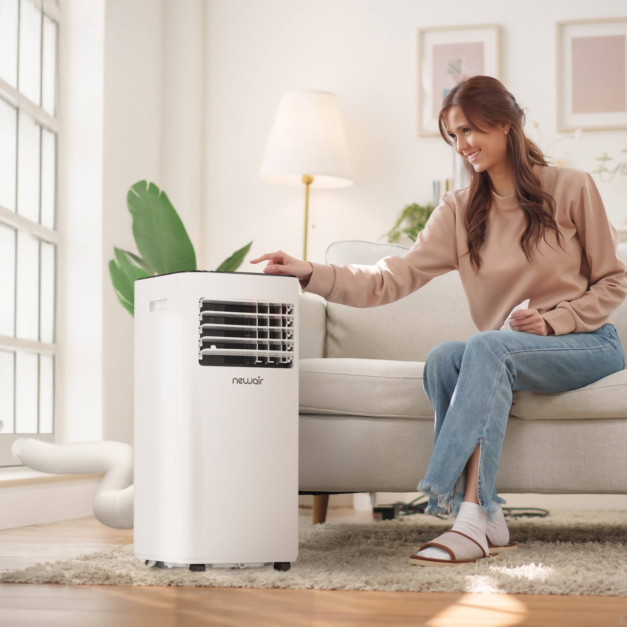 Angle. NewAir - NewAir Portable Air Conditioner 10K BTUs 6000 BTU DOE Cools up to 600 sq ft - White.