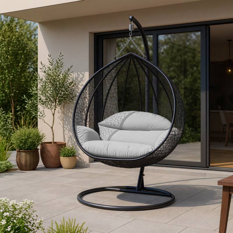 Angle. LeisureMod - Recluse Modern Wicker Teardrop Hanging Egg Chair with Stand - Outdoor Indoor Swing Chair & Cushion - White.
