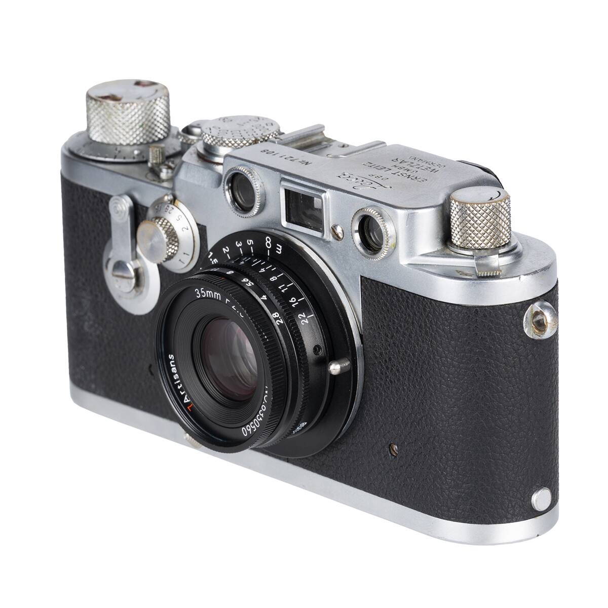 Nr. 721108  
108  
Nr. LEITZ GMSH INANSED  
80 ERNST  
2 5 2 3 S 8 2 3 T1 1 in  
9 = 5.6 8 35mm JJ 4 16  
2.8 2 2  
Artisans 320290