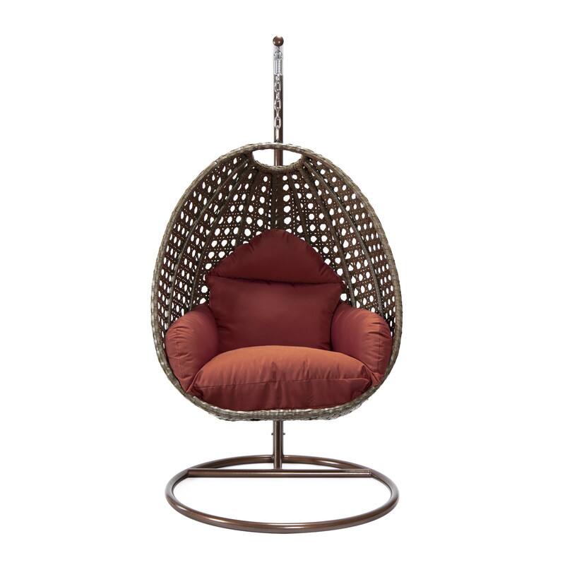 Left. LeisureMod - LeisureMod Beige Wicker Hanging Egg Chair with Iron Stand & Cushion - All-Weather Single Outdoor Patio Swing - Cherry.