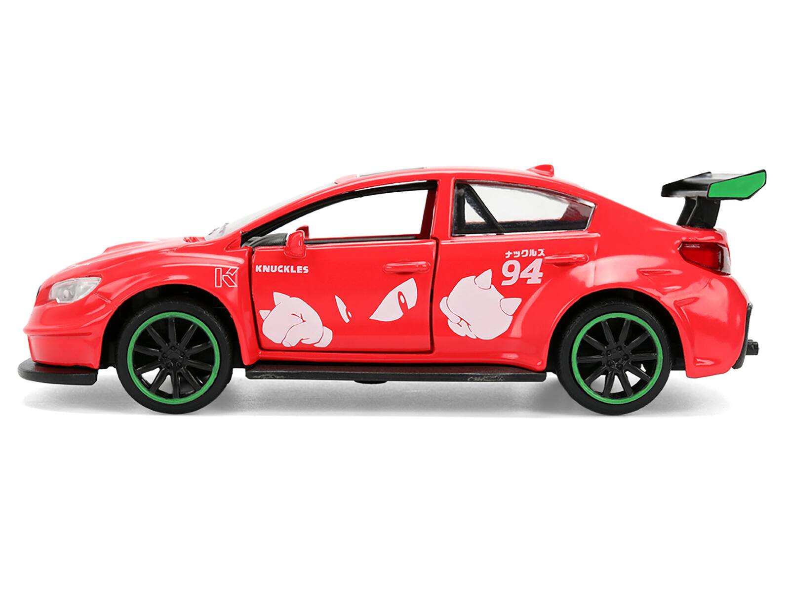 Left. Jada - 2016 Subaru WRX STI Red with "Knuckles" Graphics "Sonic the Hedgehog" (1991) Video Game "Hollywood Rides" Series 1/32 - Red.