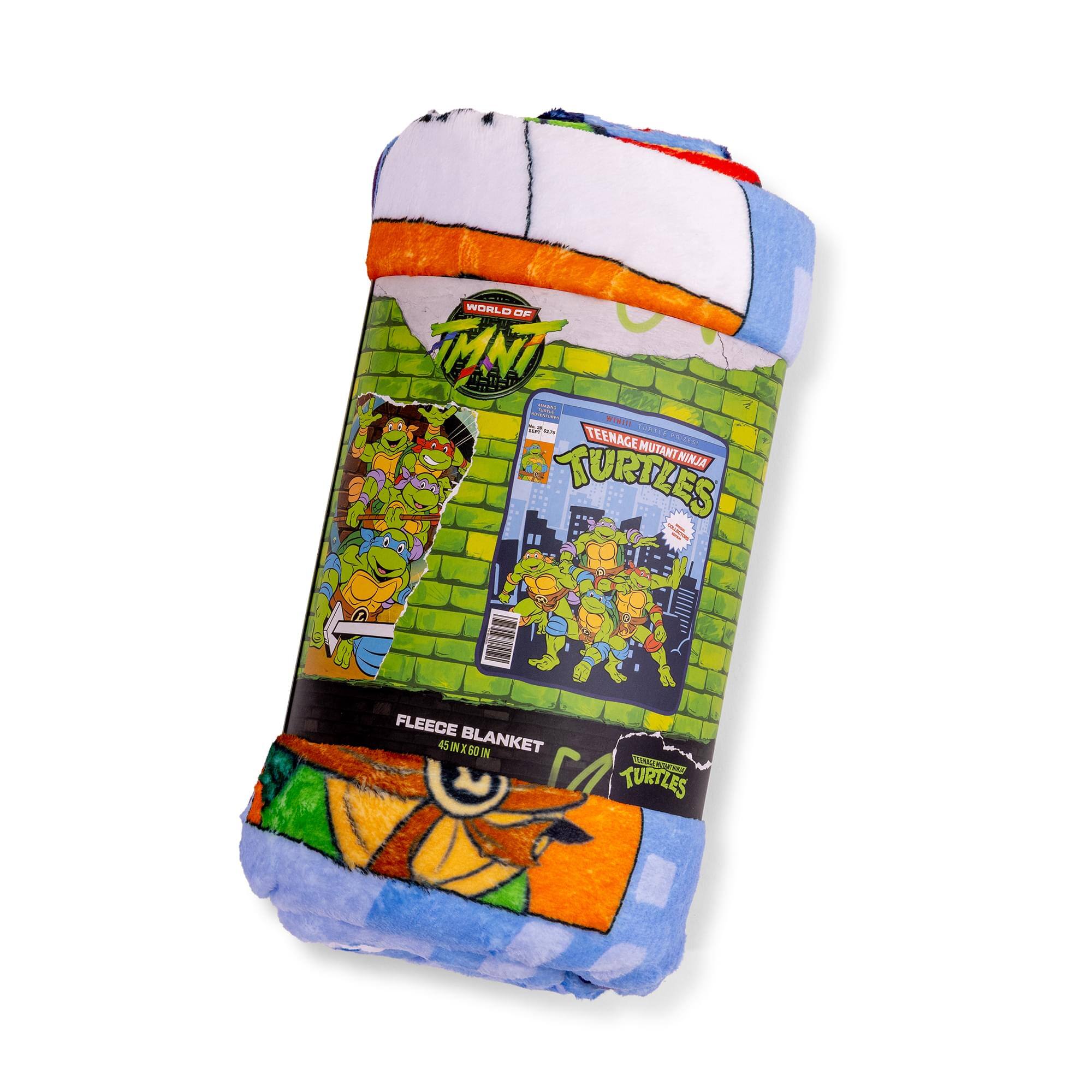 WORLD OF TMNT  
TEENAGE MUTANT NINJA TURTLES  
FLEECE 45"X60" BLANKET
