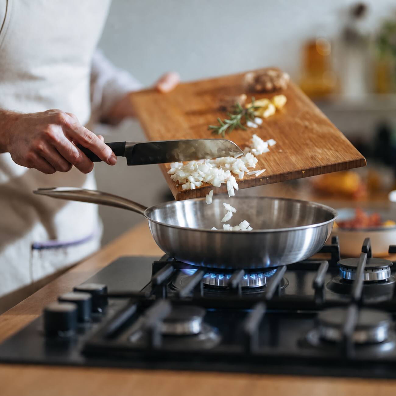 Angle. Fortune Candy - 8-Inch Fry Pan with Lid, 3-ply Skillet, 18/8 Stainless Steel, Oven Safe to 450°F, Induction Compatible, Dishwasher Safe - Silver.