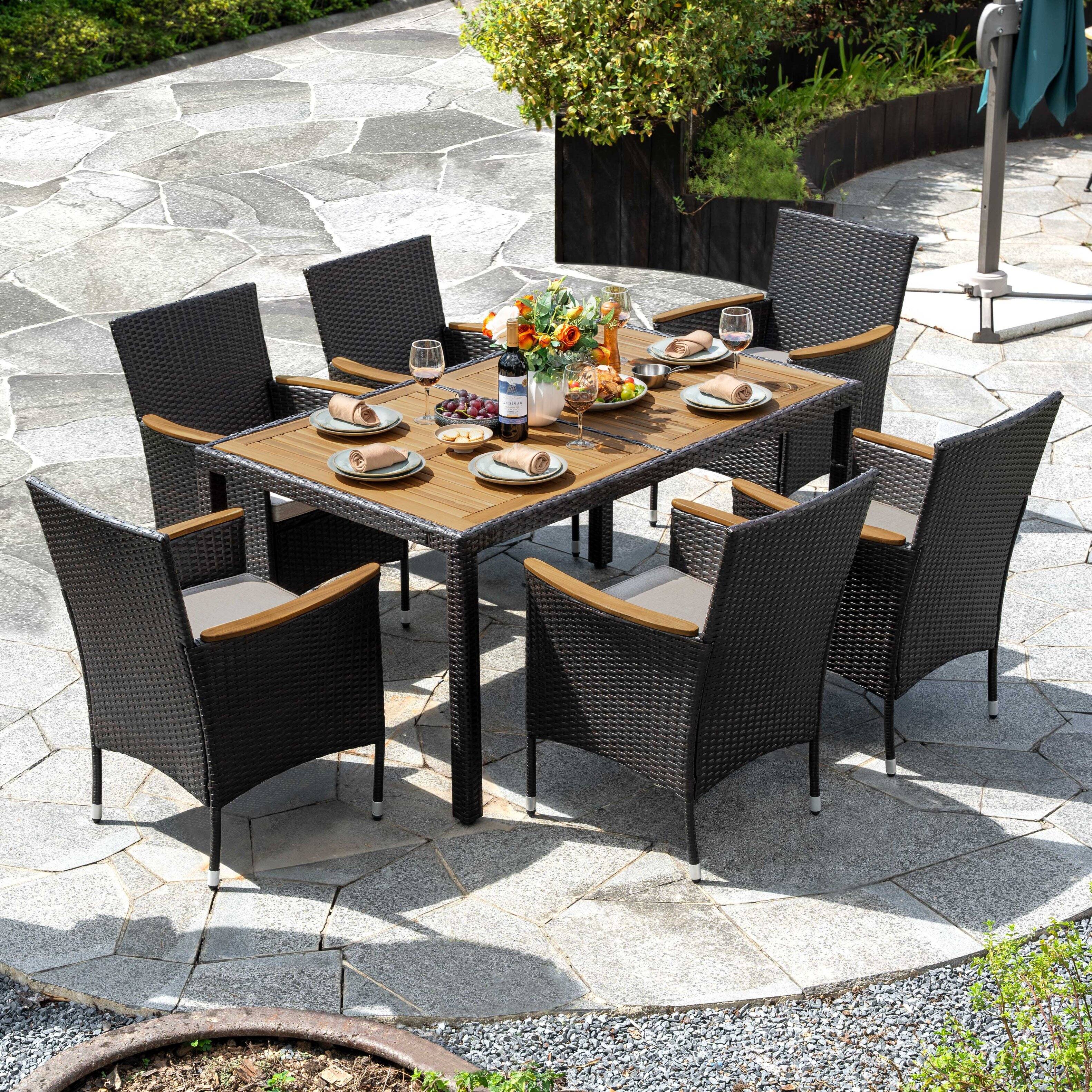 Angle. Nuu Garden - 7-Piece Acacia Wood Wicker Patio Dining Set with Cushions - Black.
