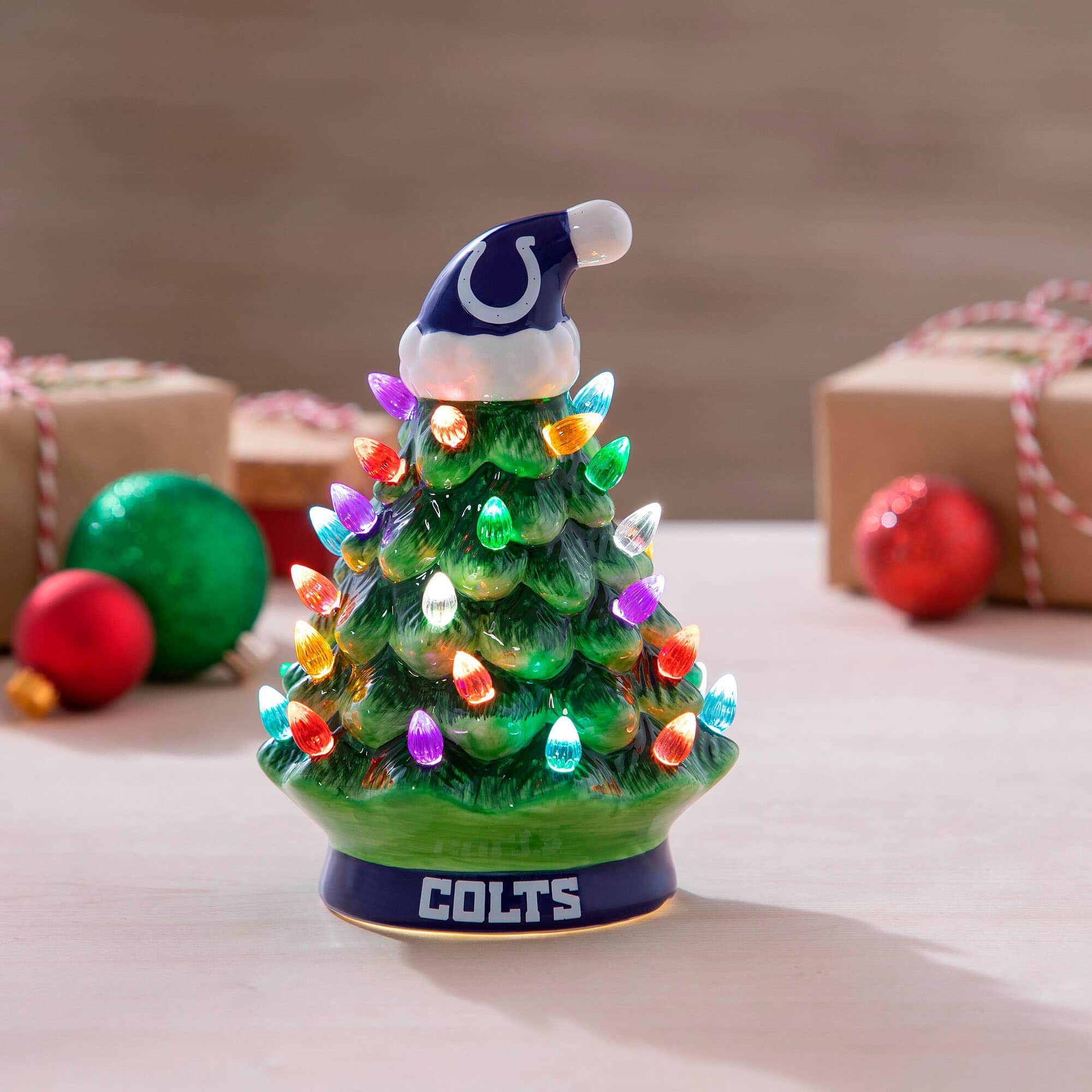 Front. Evergreen Enterprises - Indianapolis Colts 8" Light Up Ceramic LED Christmas Tree - Multicolor.