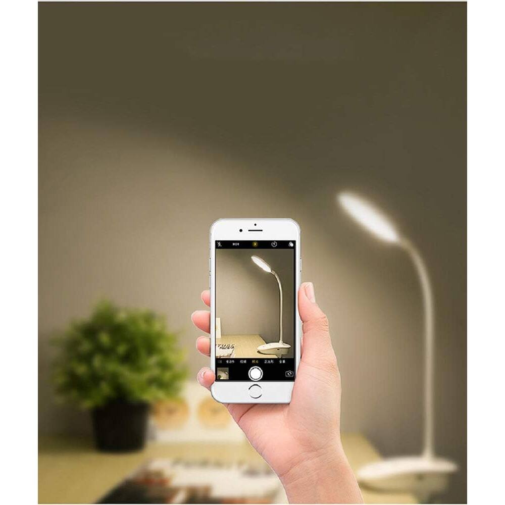 The text in the image appears to be a mix of letters and numbers. Here is the corrected and grouped text:

- TAAG
- 0
- ZAA

The text seems to be part of a code or a label, possibly related to the image or the device being used.