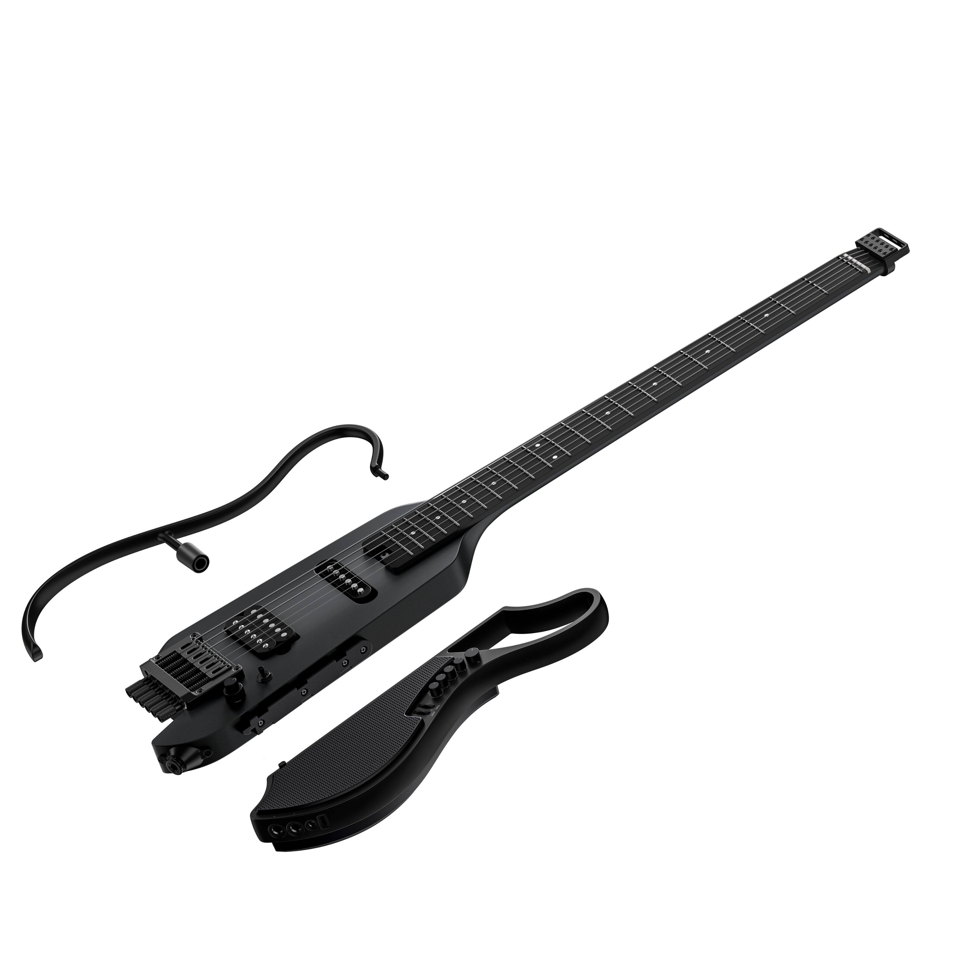 Left. Donner music - Donner HUSH X LIVE Travel Guitar with Speaker.
