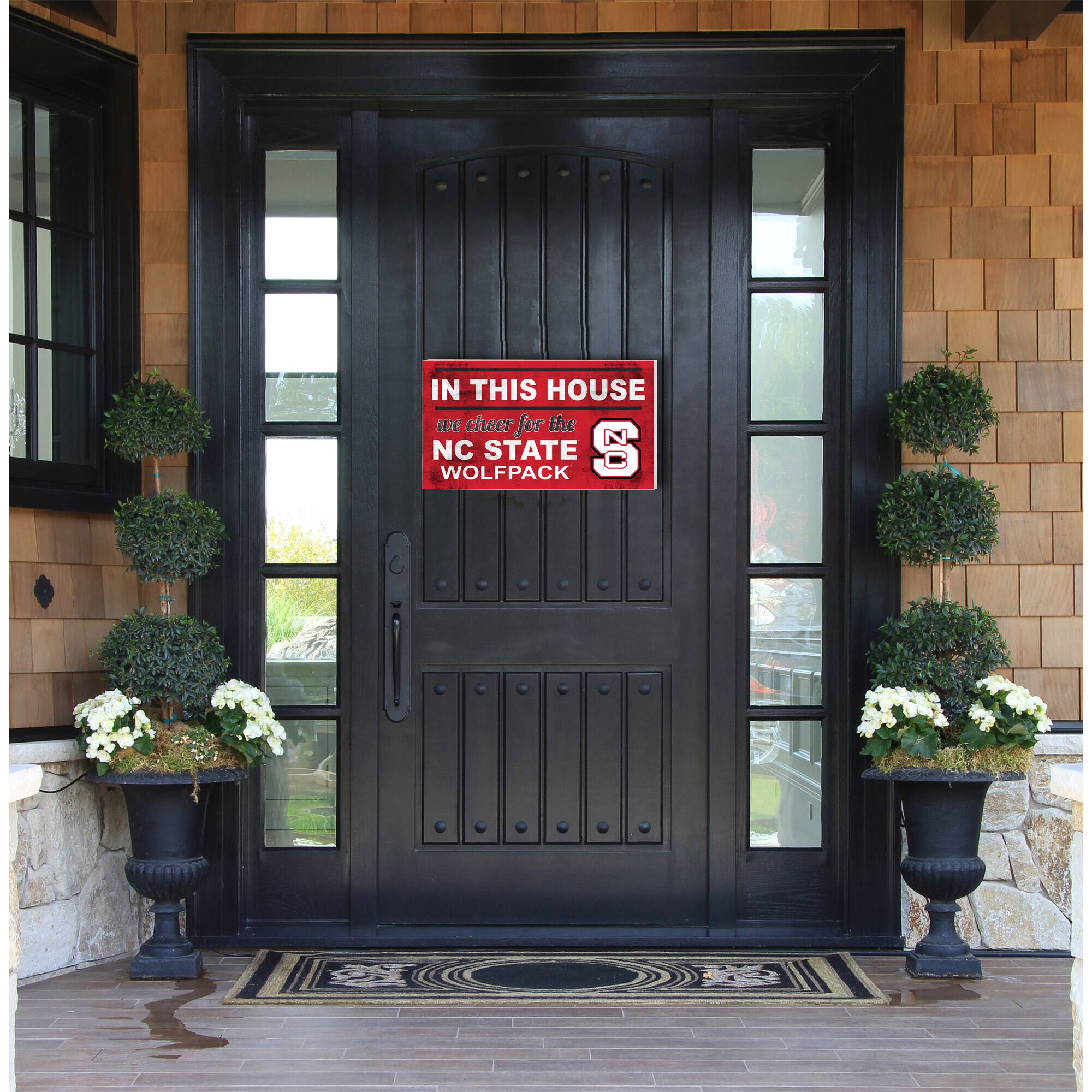 IN THIS HOUSE  
we cheer for the  
NC STATE  
WOLFPACK