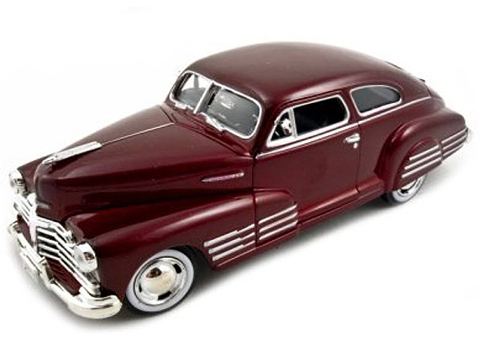 Angle. Motormax - 1948 Chevrolet Aerosedan Fleetline Dark Red Metallic 1/24 Diecast Model Car by Motormax - Dark Red.