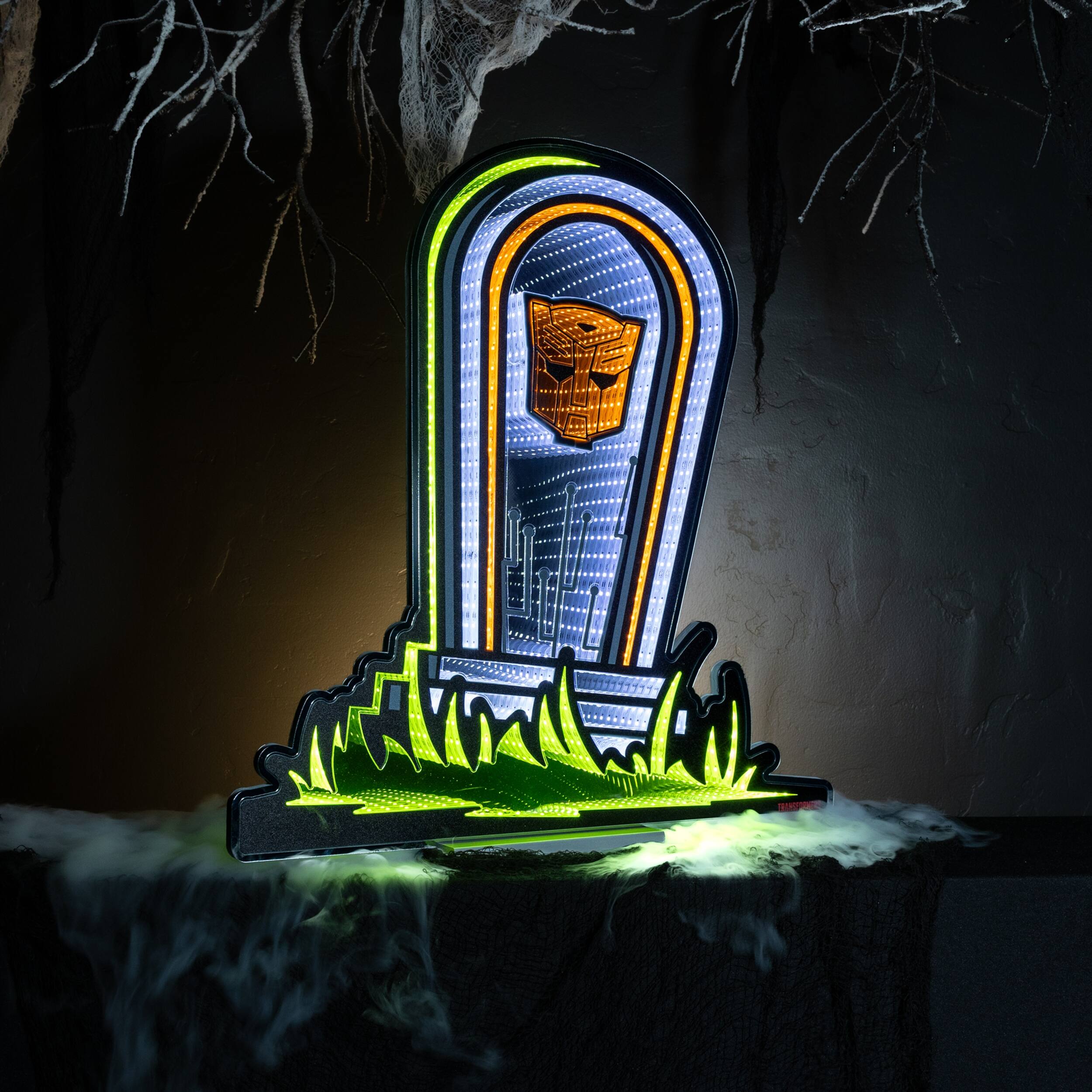 Angle. BreeBe - Transformers Autobot shieldstone Ekkolight 23.5"H - White, Orange, Green.