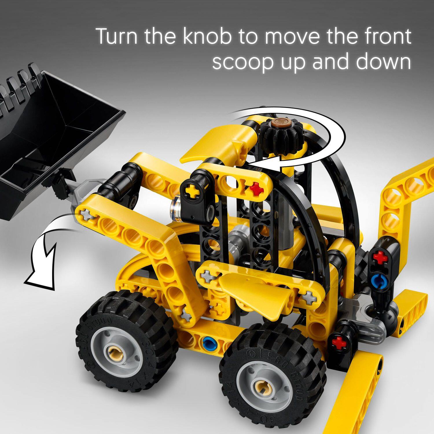 Turn the knob to move the front scoop up and down.