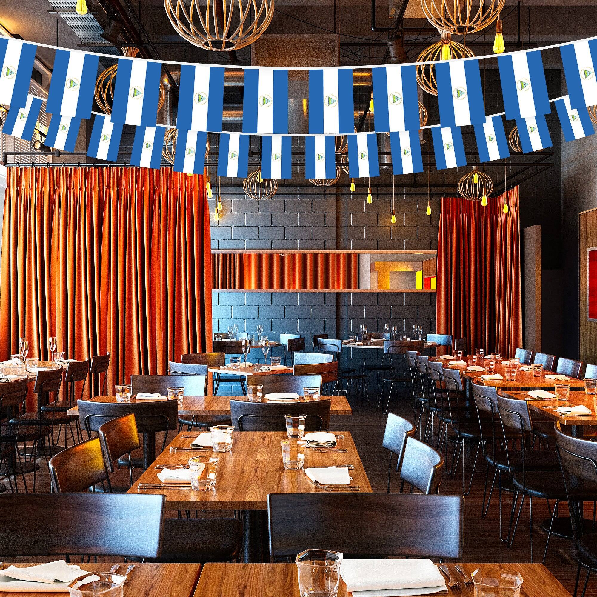 Alt View 1. G128 - Nicaragua Flag Bunting Banner — 33 ft String with 38 Mini Flags (8.2 x 5.5 in). - Assorted Colors.