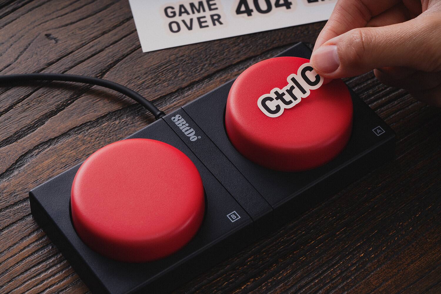 The text on the image reads "Game Over CtrIC 8BitDo."