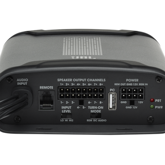 Sure, here is the corrected and grouped text from the image:

**AUDIO INPUT**
- REMOTE
- INPUT LEVEL
- LO HI

**SPEAKER OUTPUT CHANNELS**
- 1+ 2+ 3+ 4+ 5+ 6+ 7+ 8+
- 1- 2- 3- 4- 5- 6- 7- 8-

**POWER**
- REM OUT GND 12V REM IN
- GND 12V
- PWR
- TURN-ON MODE
- GND 12V
- PRT
- PWR
- LO HI
- H12
- REM DC AUDIO