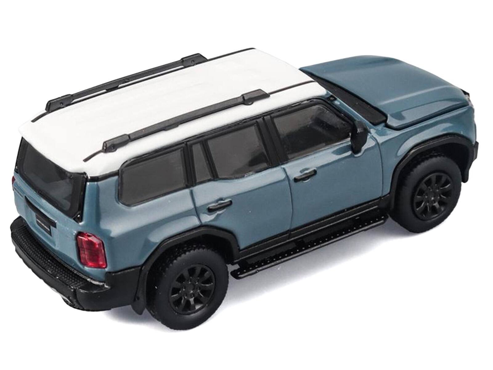 Alt View 4. Trends Hobby - Toyota Land Cruiser 250 Blue with White Top 1/64 Diecast Model Car by Trends Hobby.