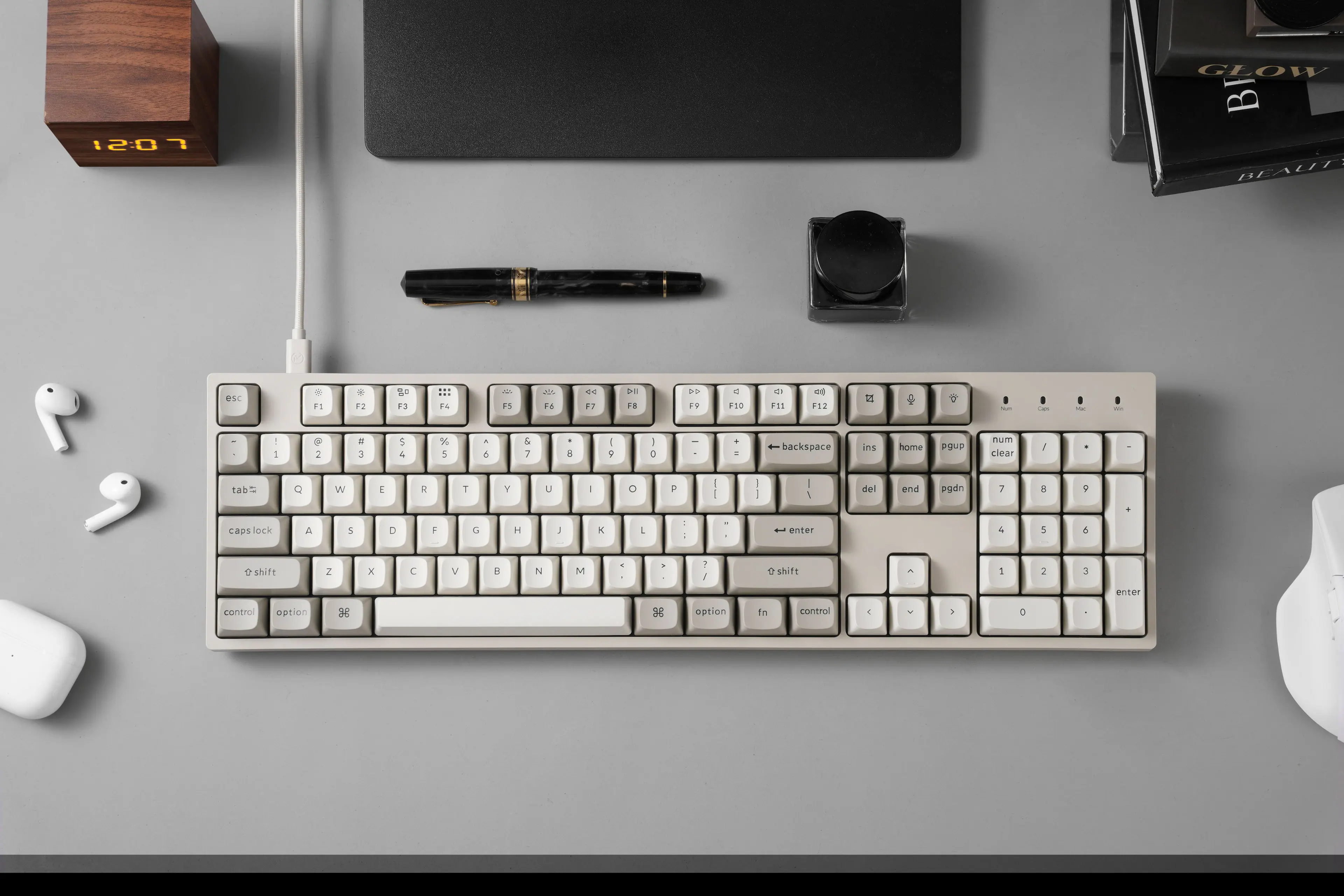 GLOW 12:07  
BEAUT eSC F1 + F2 F3 4 A FS 2. F6 -e F7 DII F8 .9 C F10 F11 ed F12 2 - -- - - 1 - 1 2 3 S 4 % 5 + 6 5 7 a I S I . + backspace ins home poup num clear 1 - - tab = Q wW E R T Y U - O P I I - I : I del end pgdn 7 8 9 . caps lock A 5 D F G H J K . - : - enter 4 5 d o shift 2 x C V e N M - . 1 / 9 shift - 1 2 3 enter control option 38 3e option fn control 4 . I O