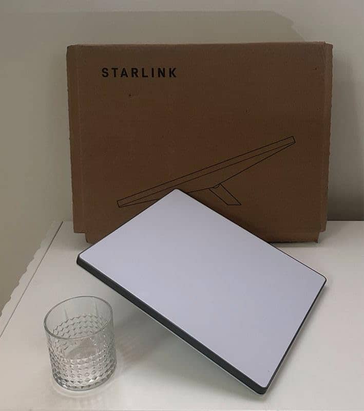 Left. STARLINK - STARLINK Mini Kit – Region Unlocked -4th Gen Mini Antenna with Wi-Fi Router (International Verison) - White.