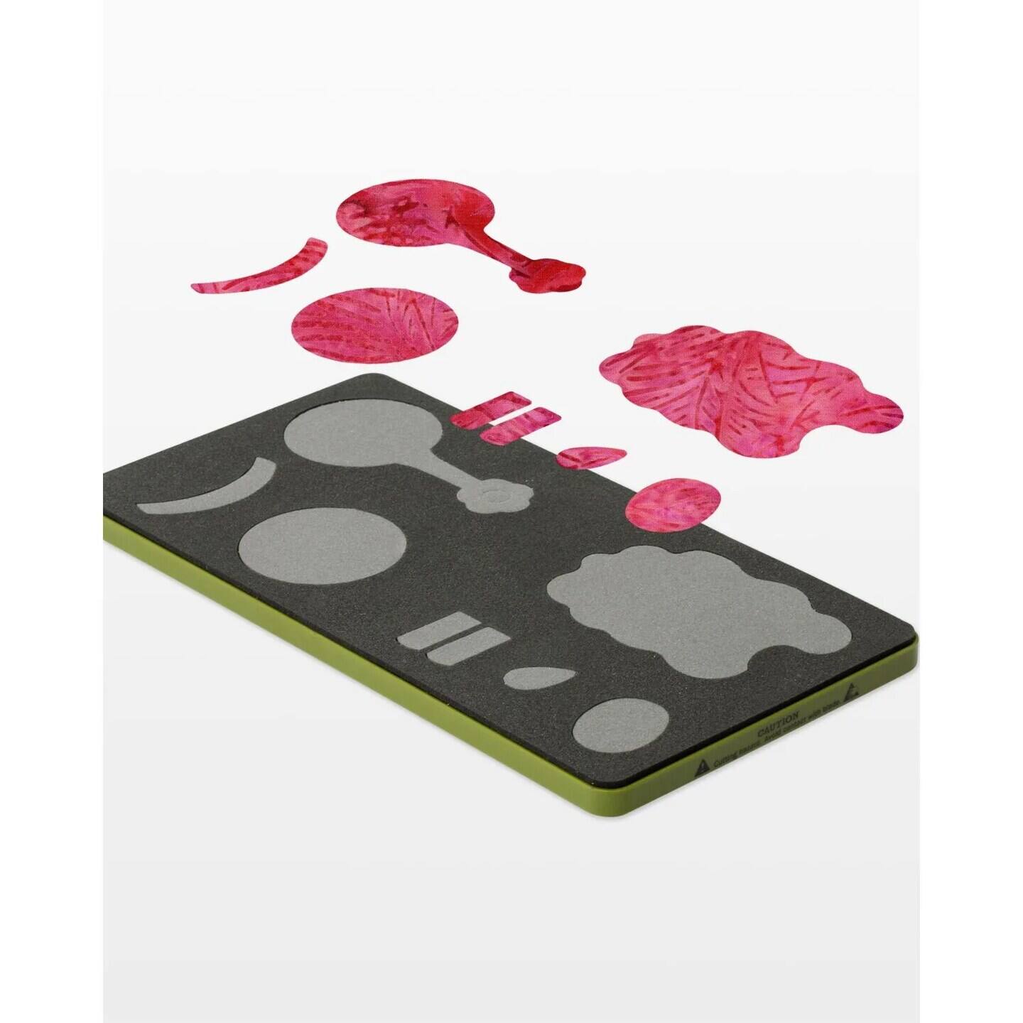 Left. AccuQuilt - Fabric Cutting Dies; Lullaby - Multicolor.