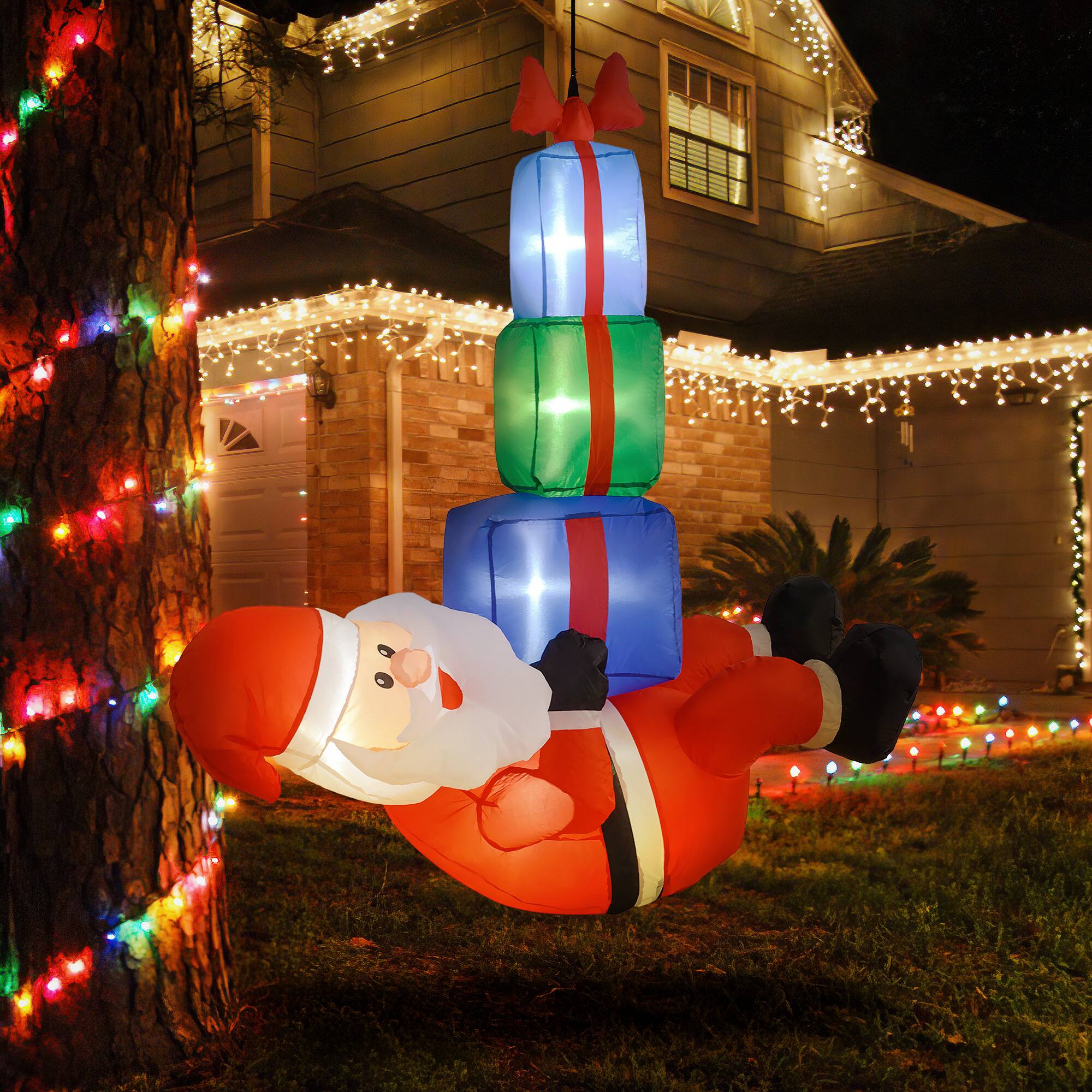Alt View 1. Outsunny - 4.6ft Inflatable Santa Hanging Under Gift Boxes with White LEDs, Blow-Up Outdoor Decor - Red.