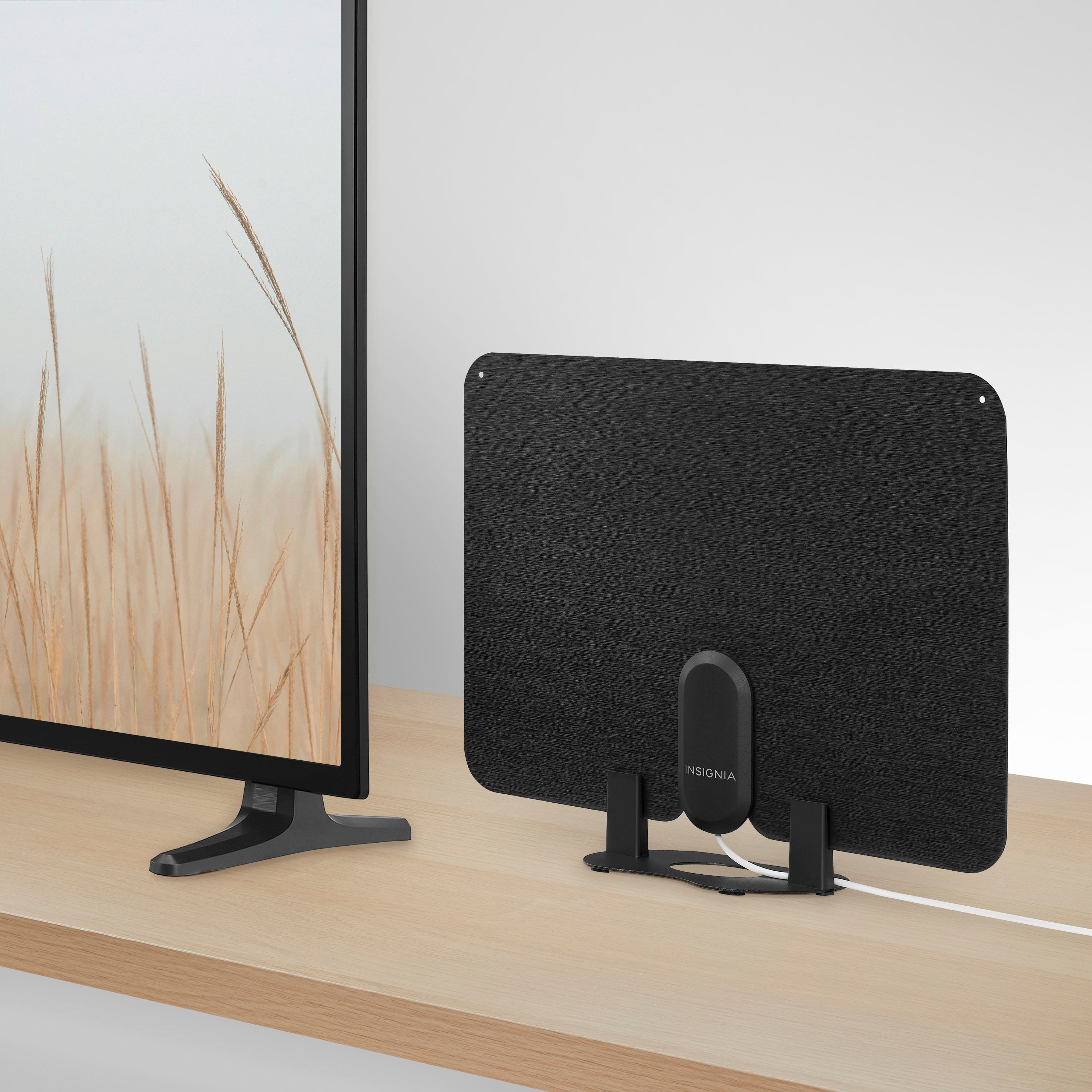 Alt View 2. Insignia™ - Amplified Ultra-Thin Indoor HDTV Antenna with 60-Mile Range - Black/White.
