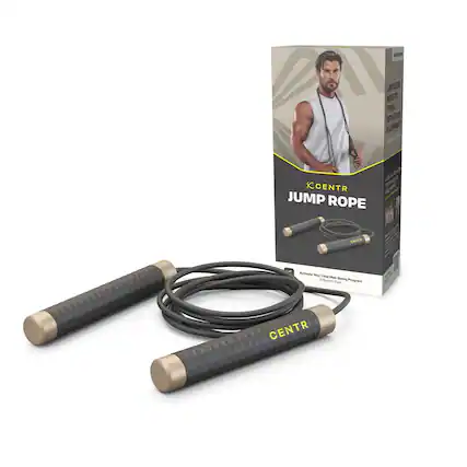 The image features a box of Centr Jump Rope, which includes a jump rope and two handles. The box is displayed in a white background, and the jump rope is attached to the handles. The box also contains a booklet, which likely provides instructions or guidance for using the jump rope.