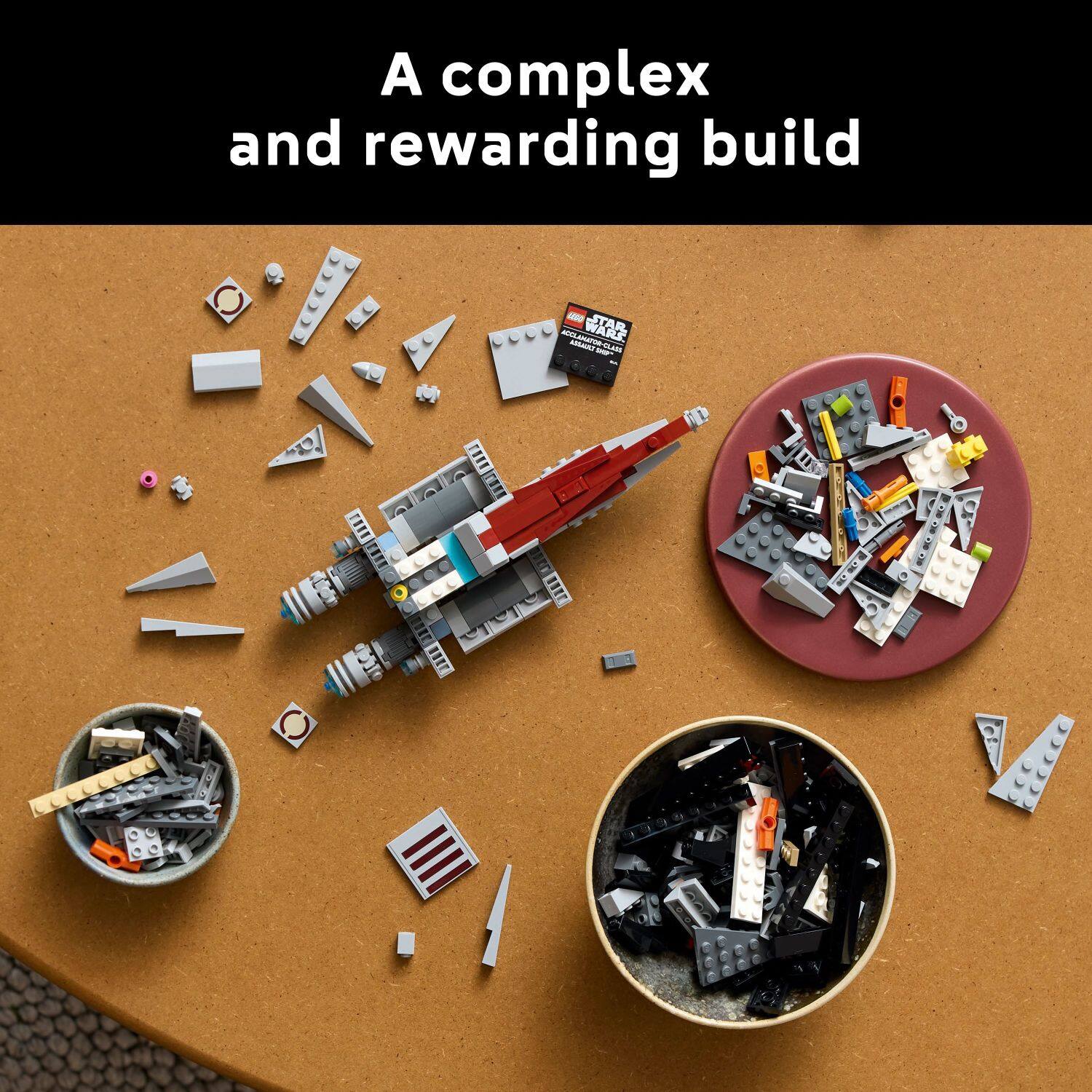 A complex and rewarding build - STAR WARS - is displayed on a table. The table is filled with various Lego pieces, including a spaceship and a bowl of Lego pieces. The scene showcases the intricate details and assembly required to create a Star Wars-themed Lego model.