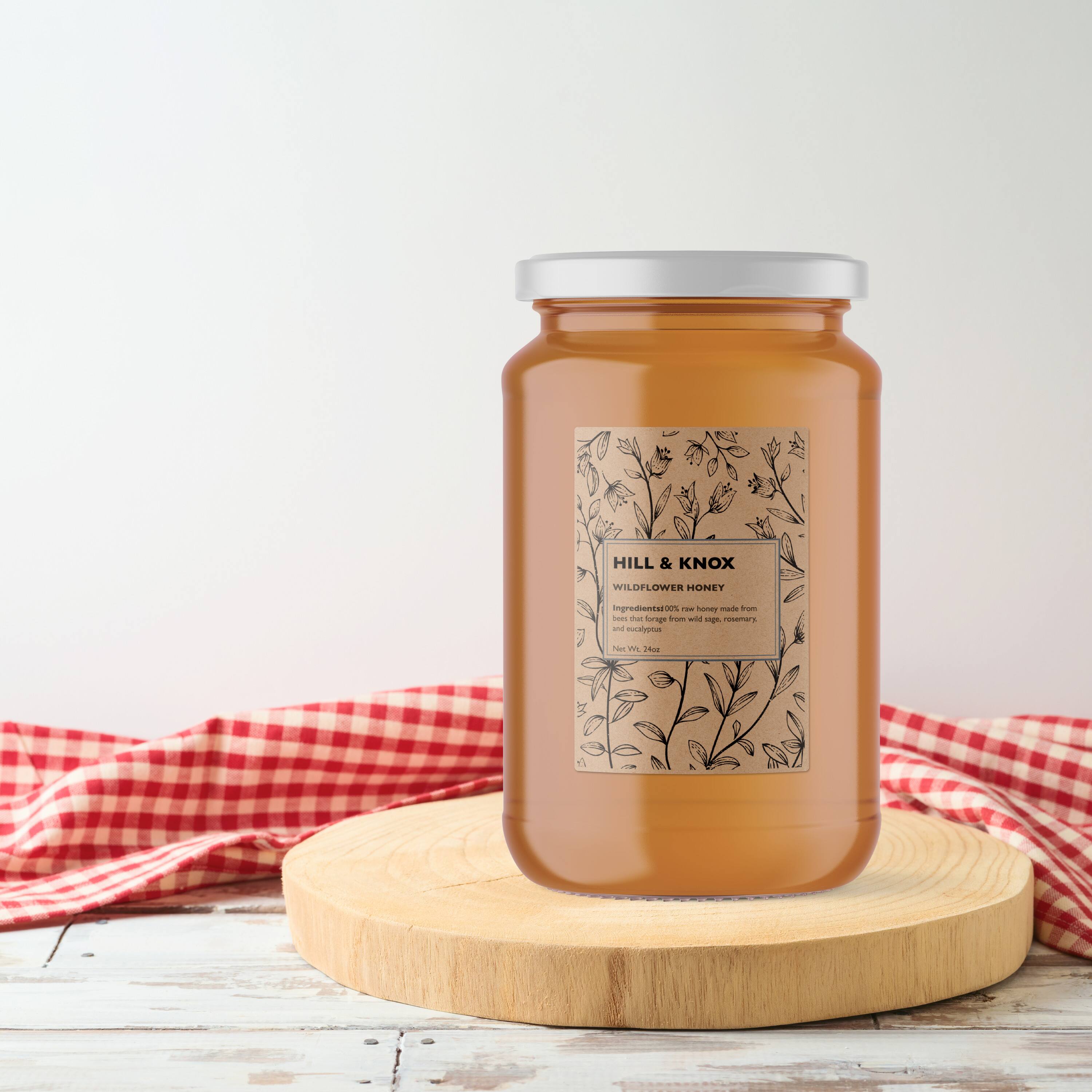 HILL & KNOX  
WILDFLOWER HONEY  
Ingredients: 100% raw honey made from bees that forage wild sage, rosemary, and other local flora.  
Net Wt. 2 lbs