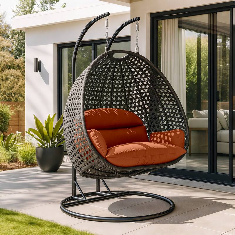 Angle. LeisureMod - Leisuremod Outdoor 2-Person Charcoal Wicker Egg Swing Chair with Steel Stand, Washable Cushions & Waterproof Cover - Orange.