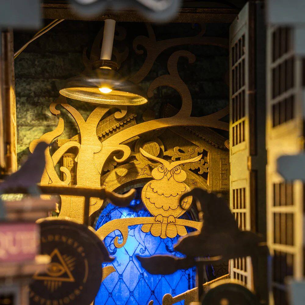 Left. 3D Puzzle - DIY 3D Book Nook Kit: Magic House 216 pieces.