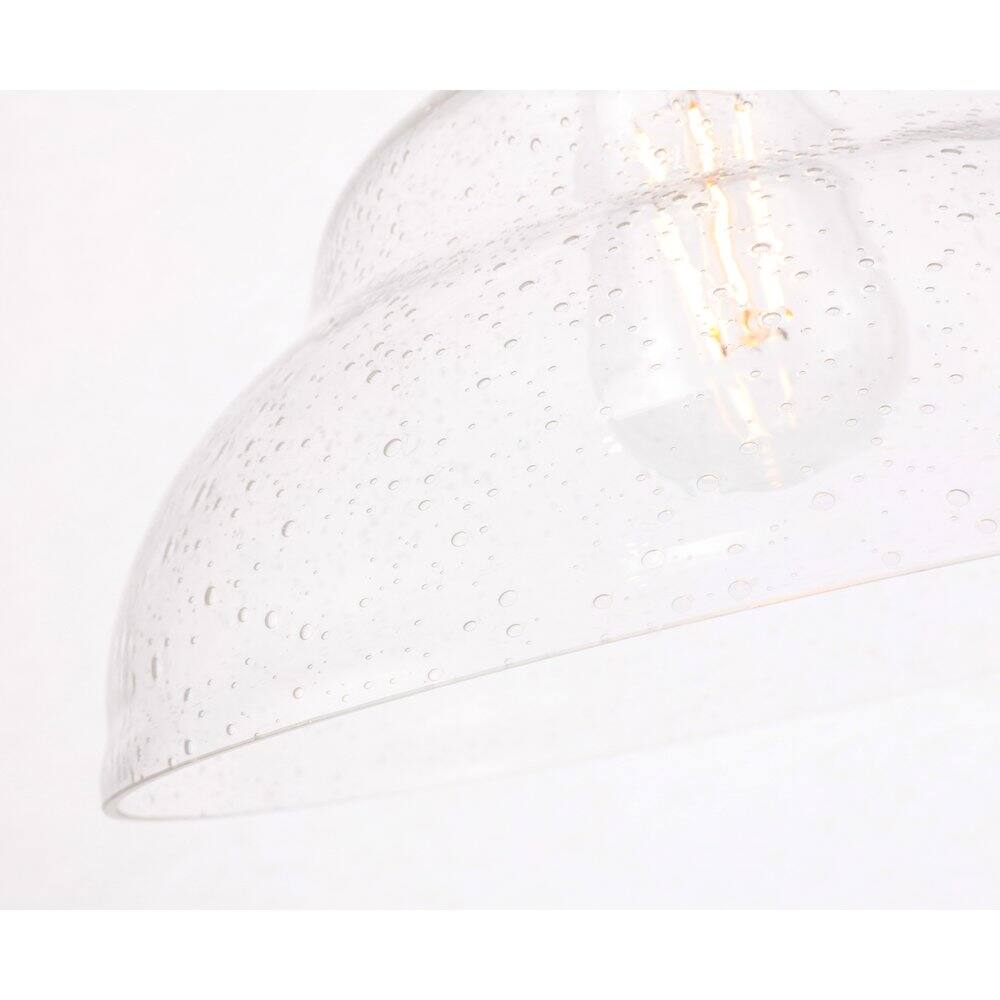 Left. Living District - Gil 1 Light Brass And Clear Seeded Glass Pendant - Brass And Clear Seeded Glass.