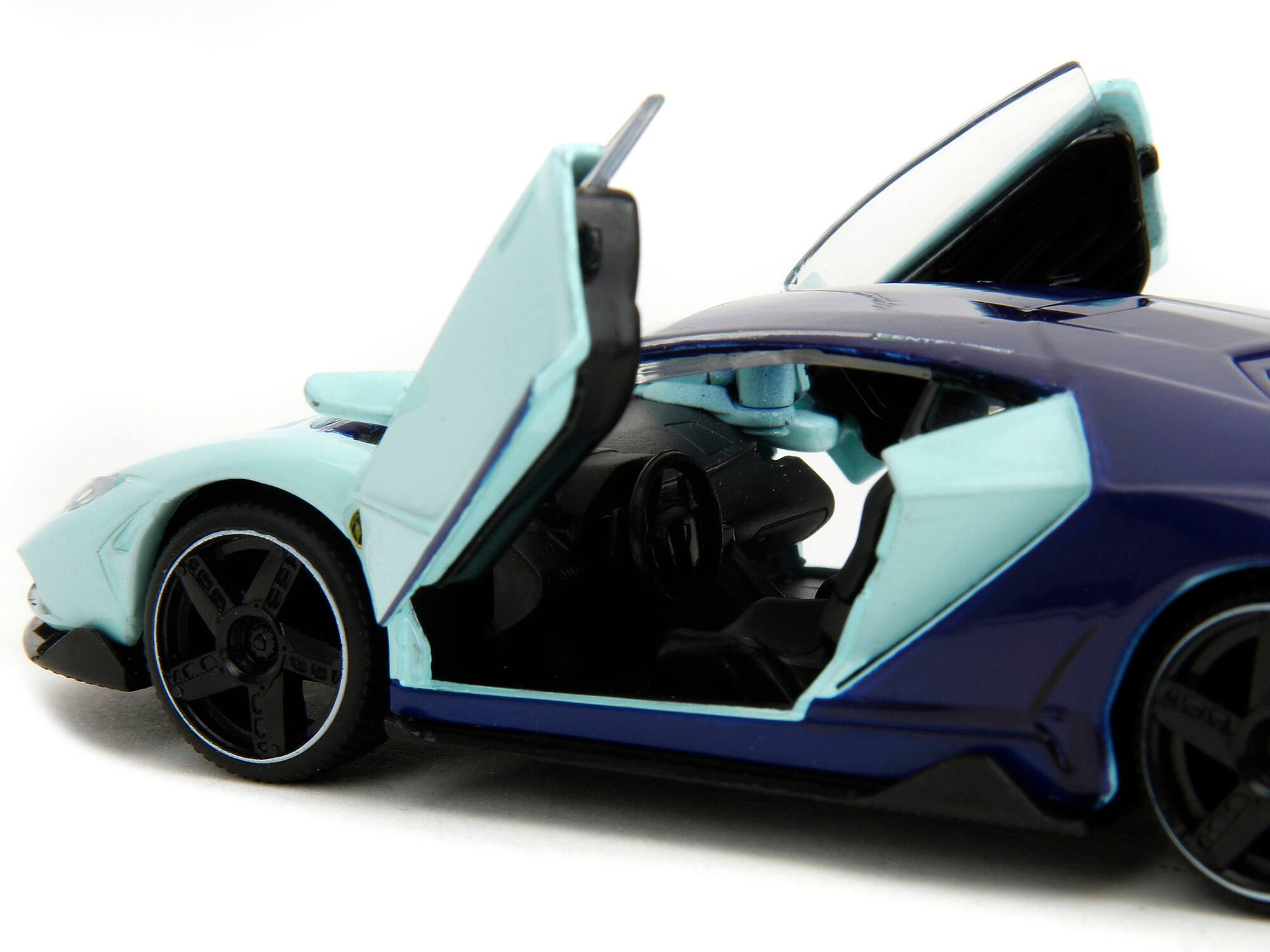 Left. Jada - Lamborghini Centenario Light Blue and Purple "Pink Slips" Series 1/32 Diecast Model Car by Jada - Light Blue And Purple.