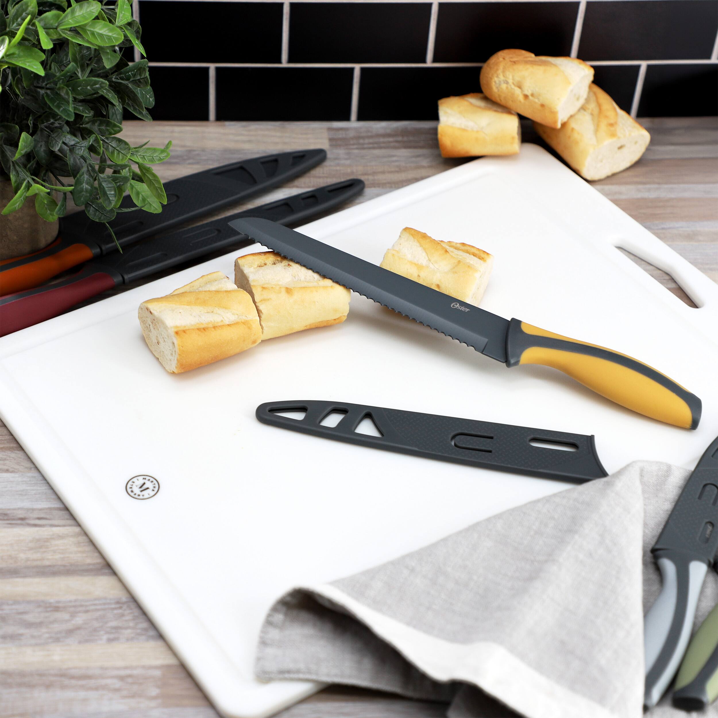 Alt View 4. Oster - Oster Ronnan 12 Piece Precision Stamped Cutlery and Sheath Set in Multi.