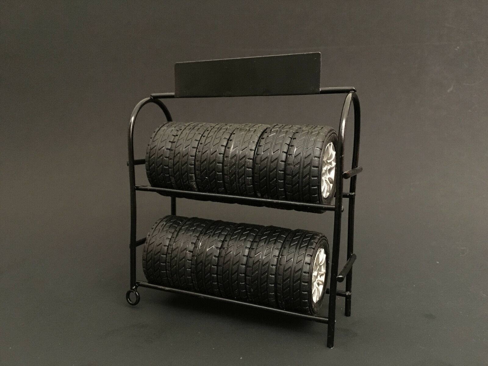 Front. American Diorama - Metal Tire Rack with Rims and Tires for 1/24 Scale Models by American Diorama.