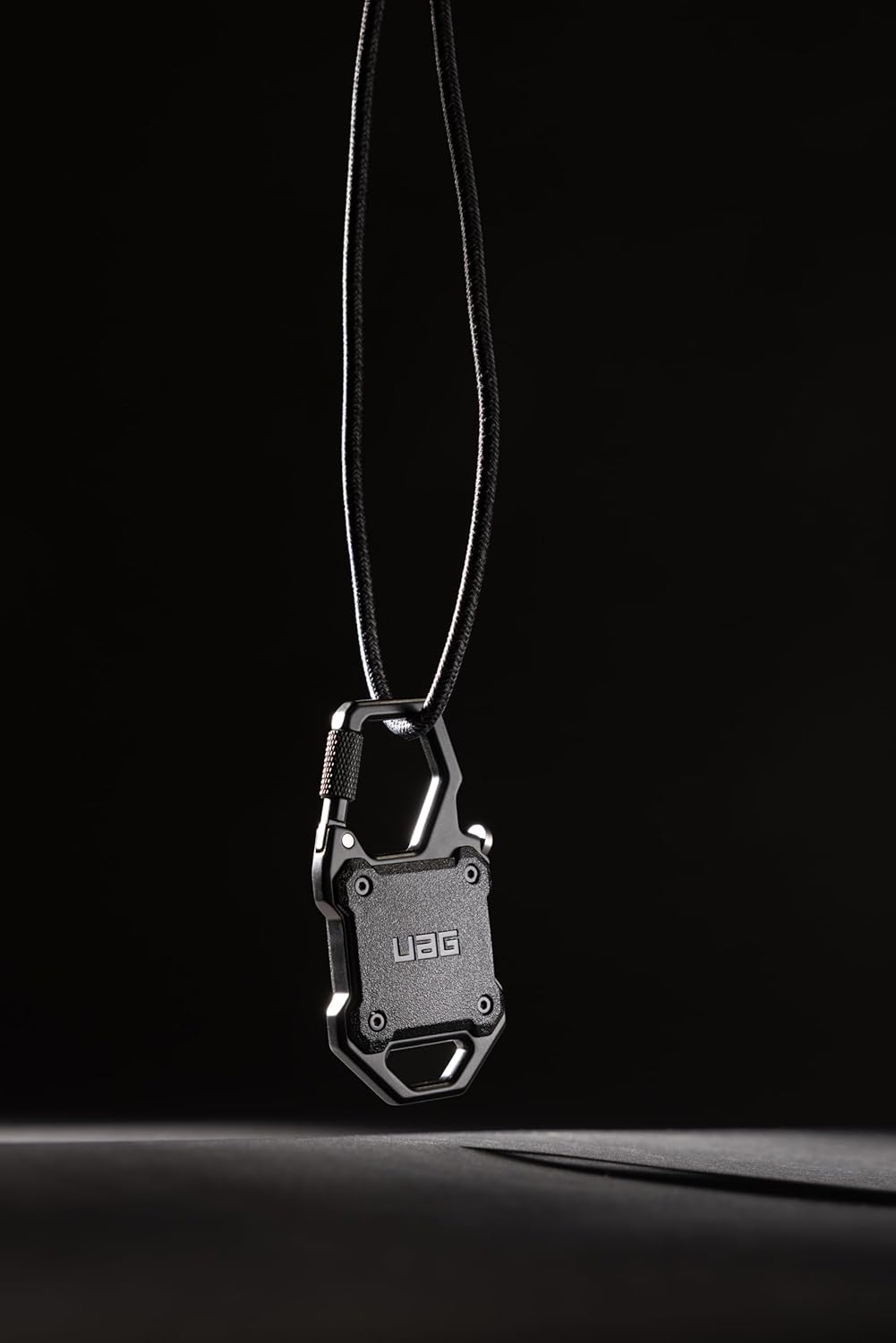 Alt View 1. UAG - AirTag Case w Built-in Bottle Opener & Carabiner for Keys, Luggage & Bags - Blackout.