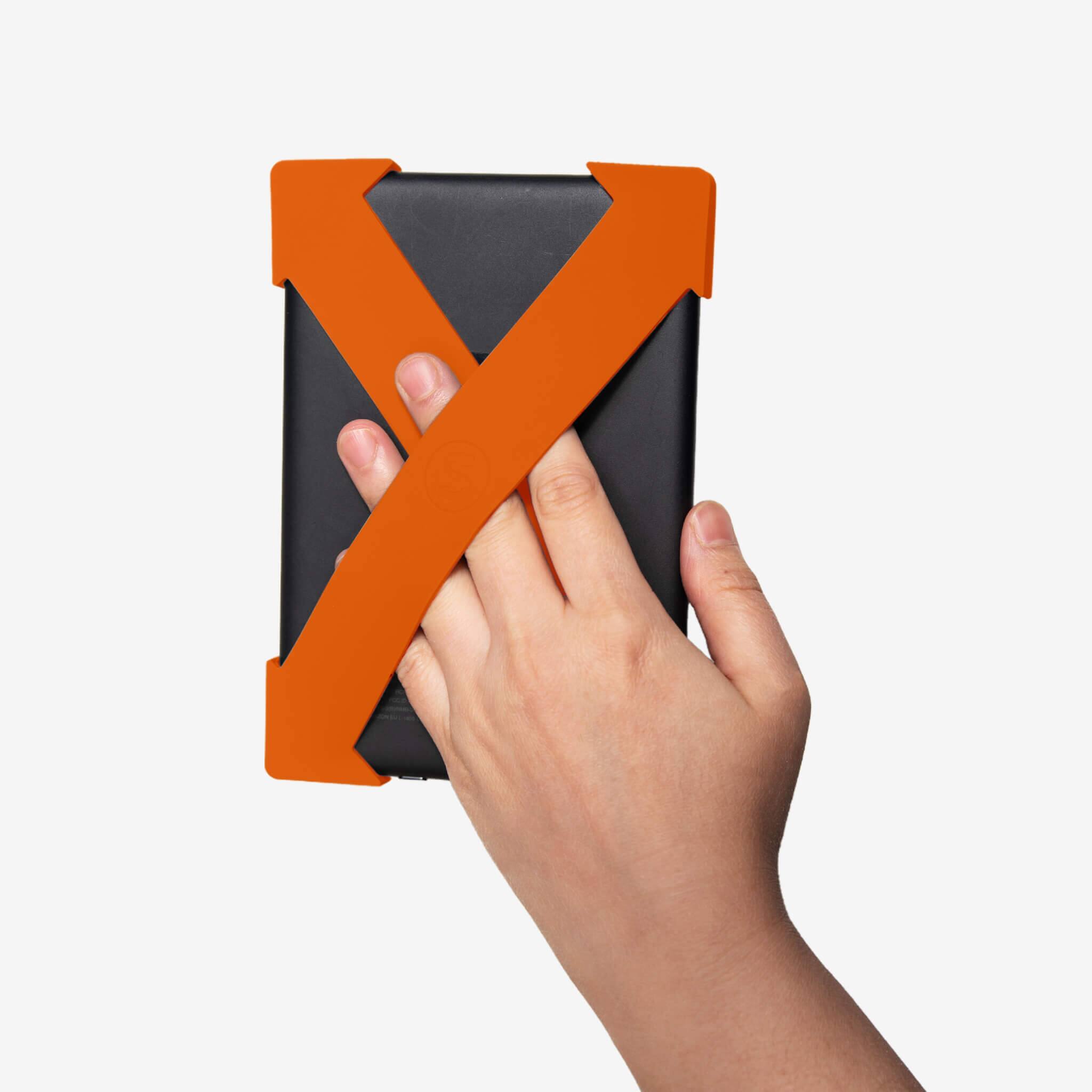 Angle. Strapsicle - Hand Strap for Kindles & Kobos - Paperwhite 2024 & 2021 - 2 Straps - Lightweight Grip - Large - Burnt Orange - Burnt Orange.