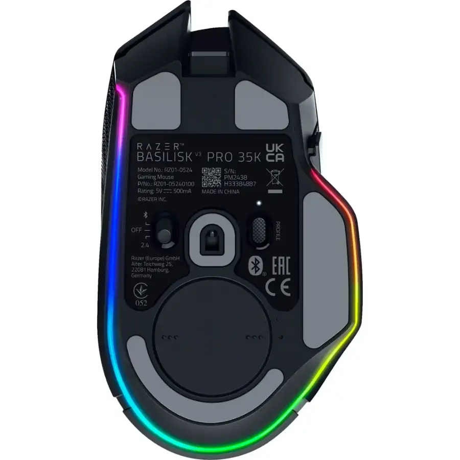 The image shows a Razer Basilisk Pro 35K CA gaming mouse. The mouse has a colorful design, featuring a rainbow pattern on its side. The gaming mouse is equipped with a 35K sensor, making it suitable for gaming enthusiasts. The mouse is made in China and has a profile EAC, which is a European Union (EU) compliance marking.
