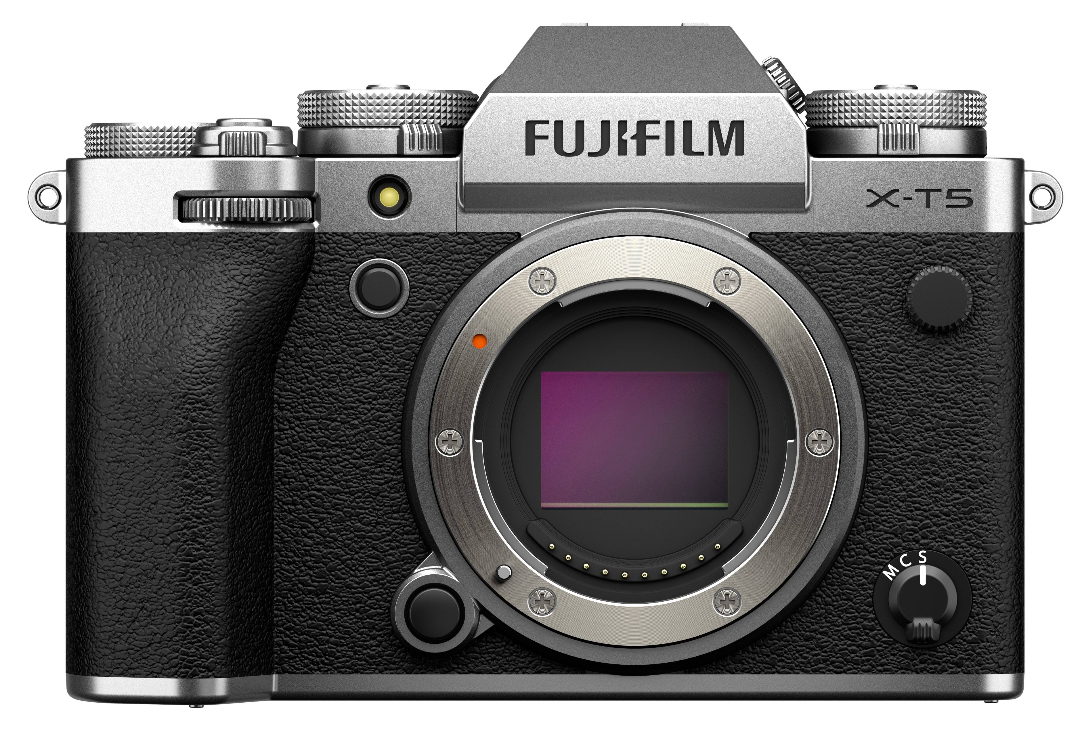 The image features a FUJIFILM X-T5 camera, which is a digital camera. The camera has a large lens and a viewfinder, making it suitable for capturing high-quality images. The camera is designed with a sleek black and silver color scheme, giving it a professional and modern appearance. The FUJIFILM X-T5 camera is likely to be used by photographers and enthusiasts who appreciate its advanced features and capabilities.