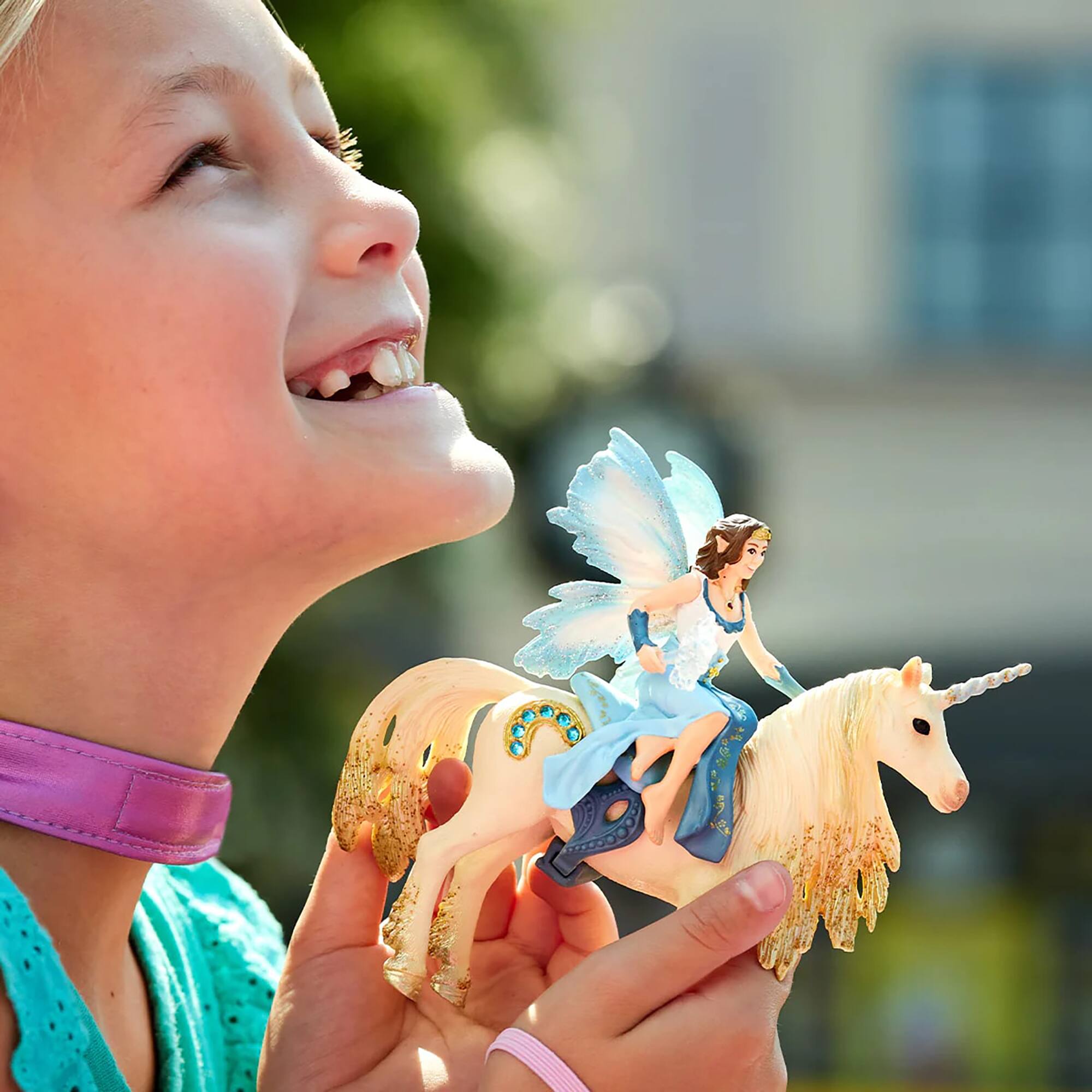 Back. Schleich - Bayala: Eyela Riding On Golden Unicorn.